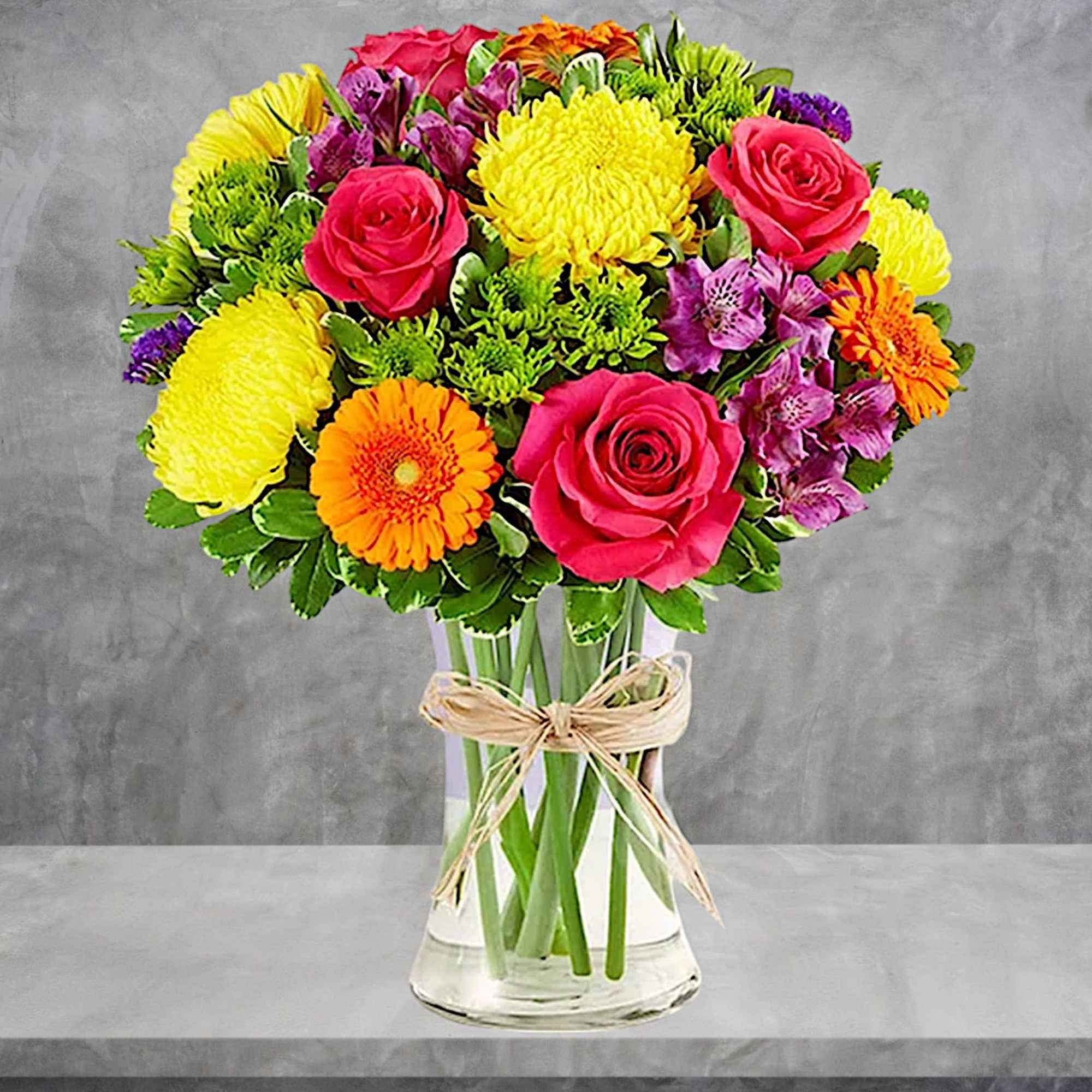 Mixed bouquet of roses, chrysanthemums, gerbera daisies, and alstroemeria in a glass vase, photo 3 of 5