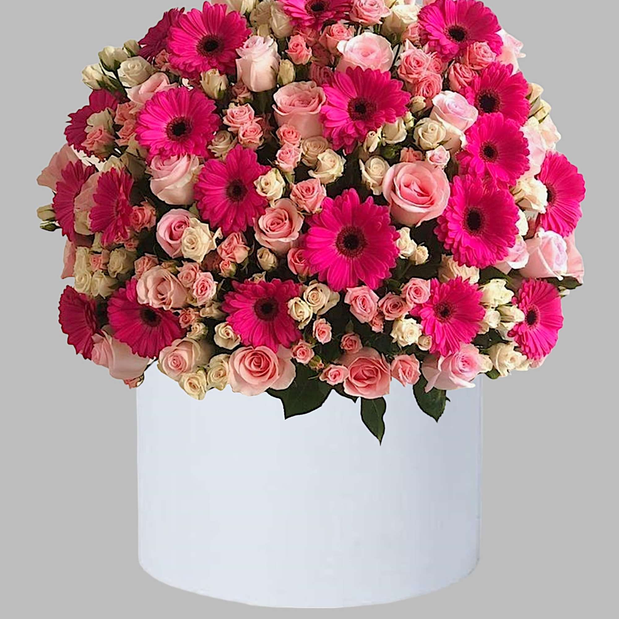 Red roses are beautifully arranged in a white cylinder box. Have them, photo 4 of 4