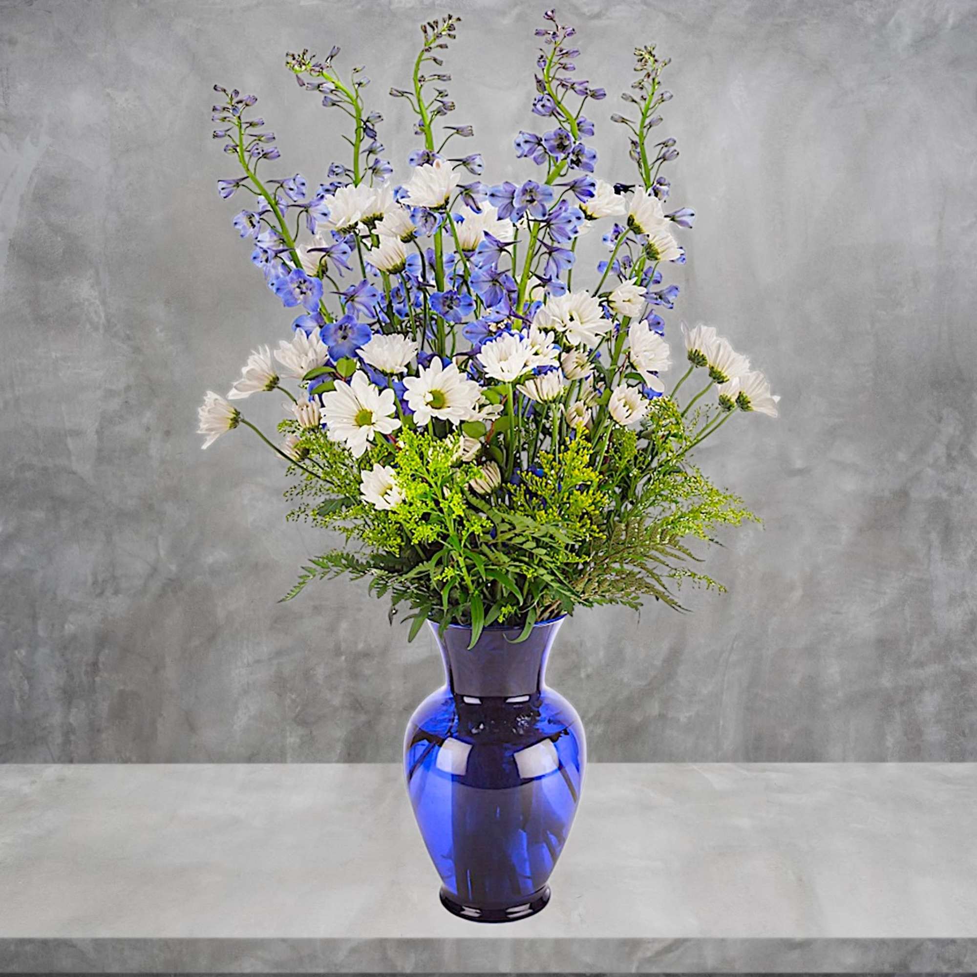 This tall blue and white arrangement is a breezy breath of summer, photo 3 of 5