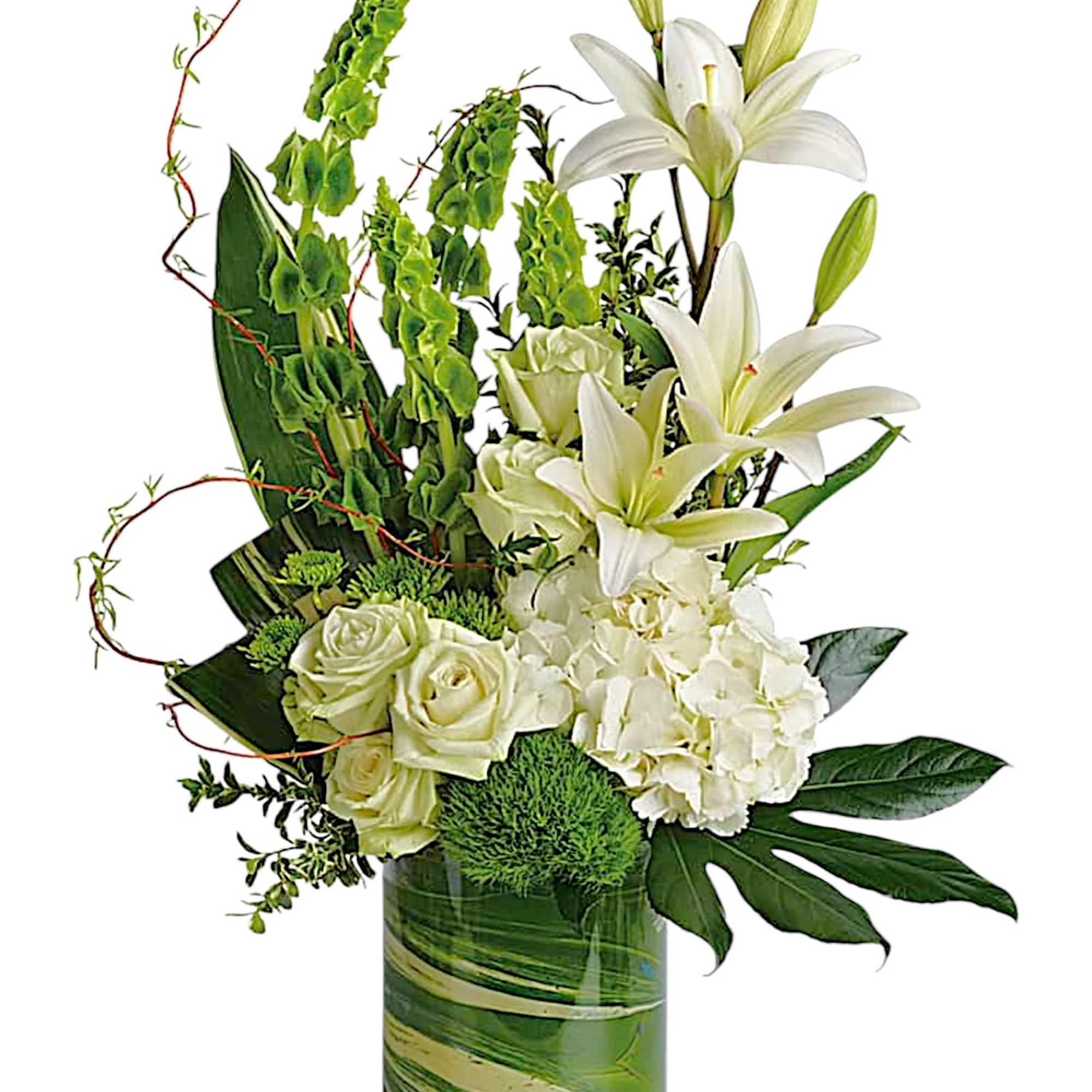 White lilies and roses arranged in a green glass vase