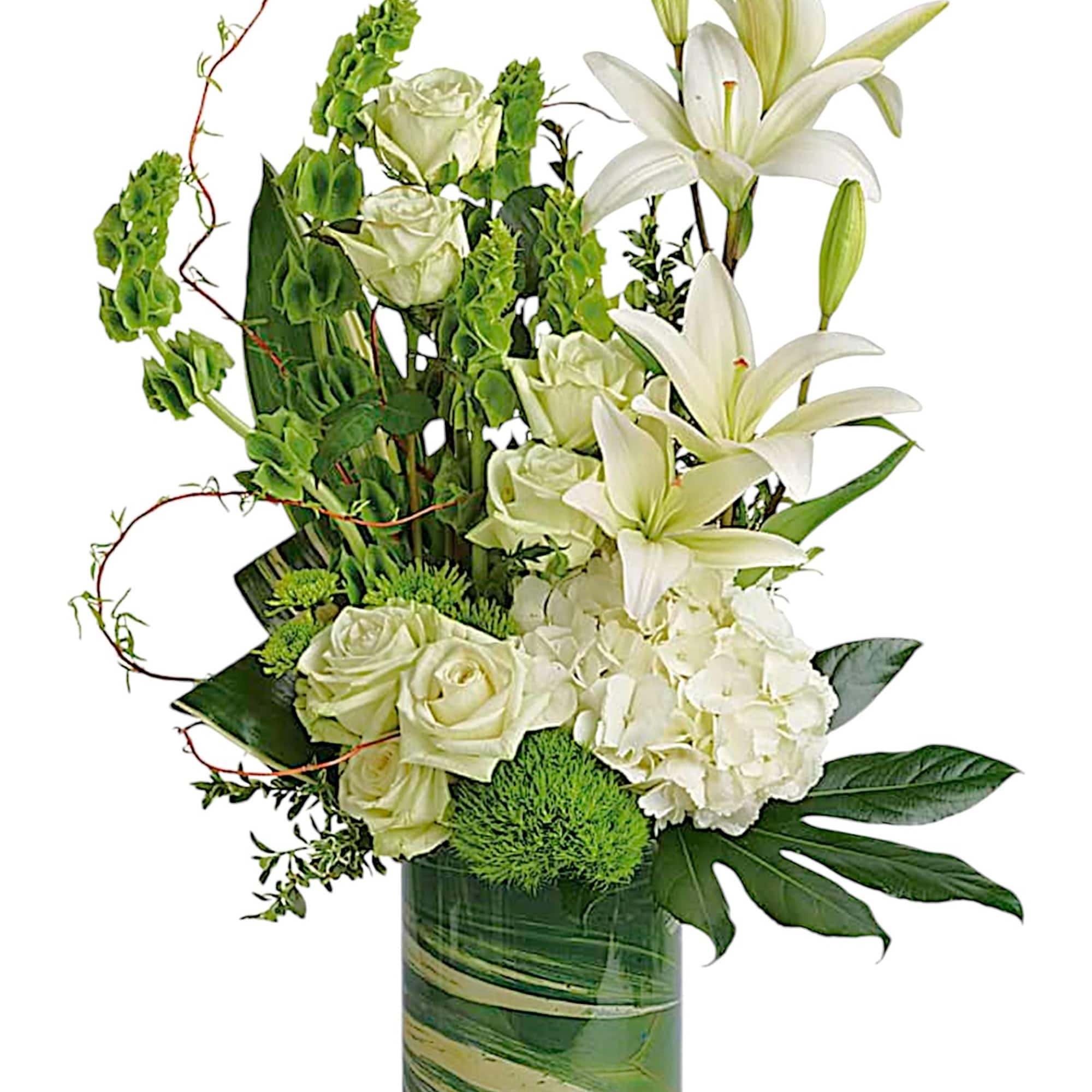 White roses and lilies in a green glass vase