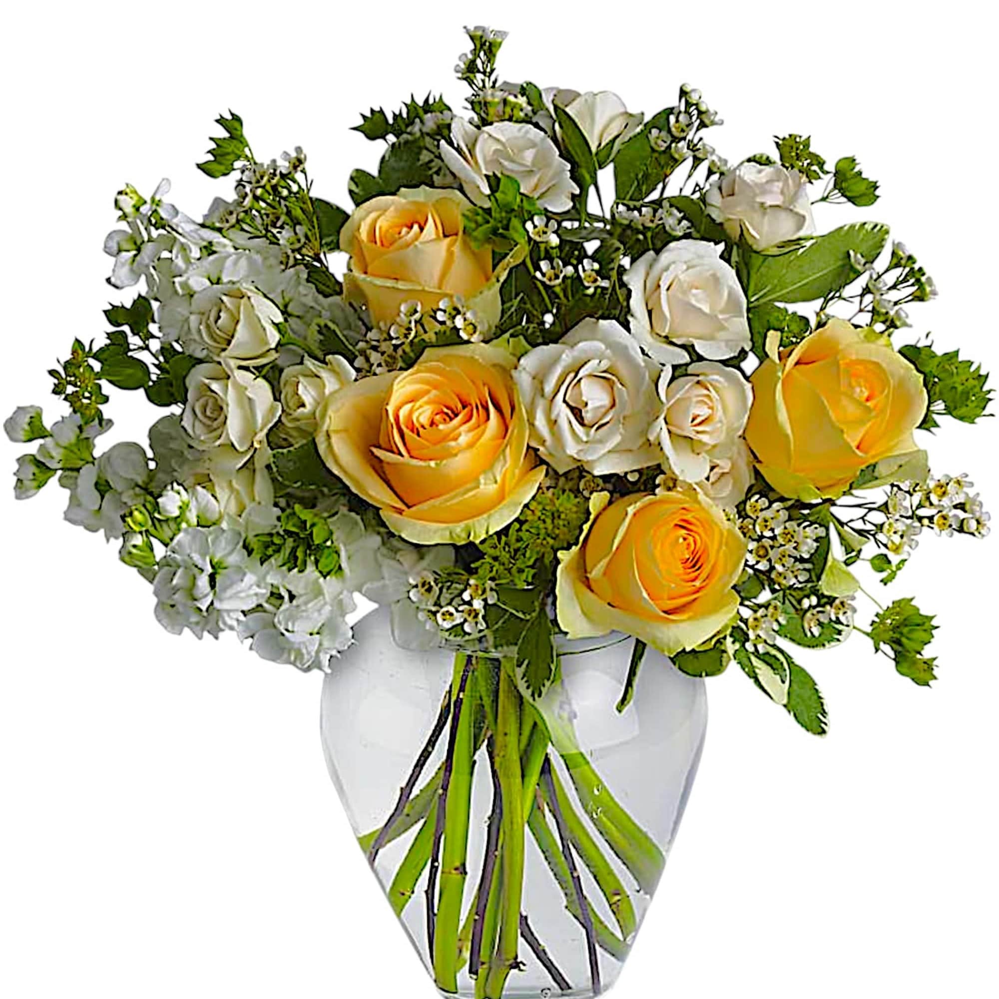 Yellow and white roses arranged in a clear glass vase