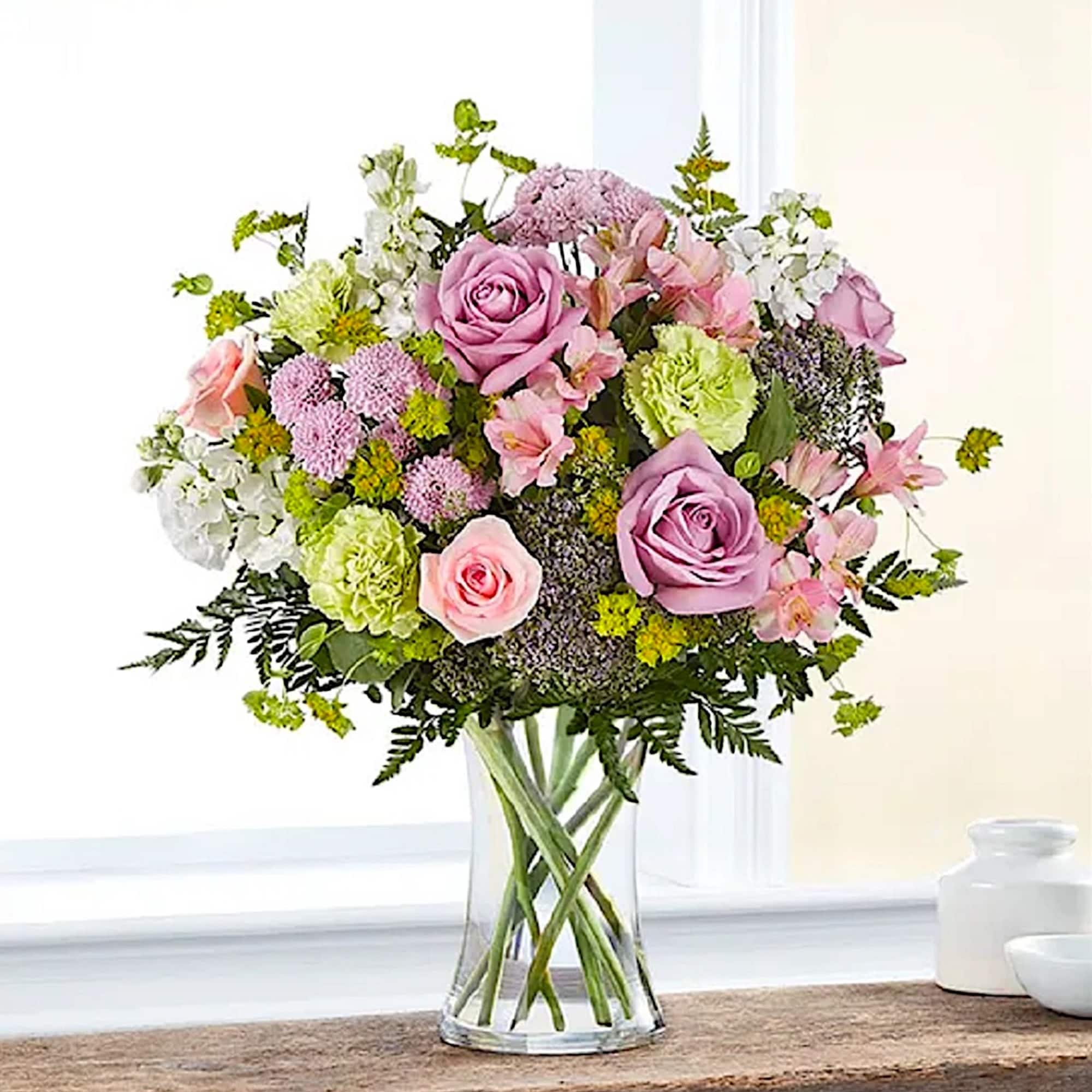 Pink and lavender mixed bouquet in a clear glass vase, photo 6 of 6