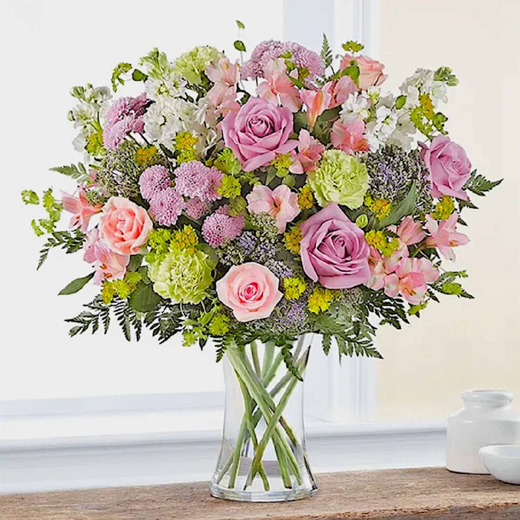 Mixed pink and white flower bouquet in a clear glass vase, photo 2 of 6