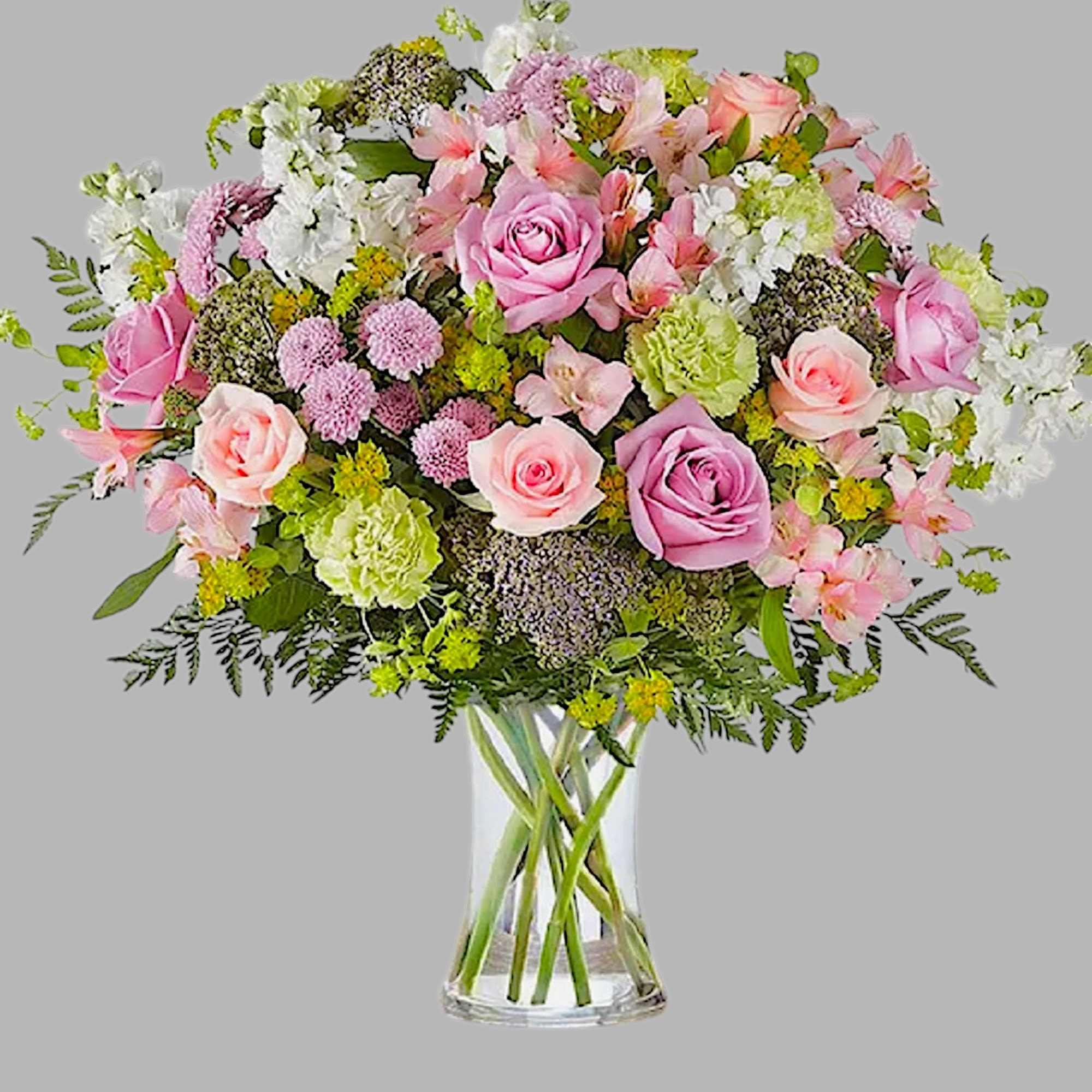 Pink and white mixed bouquet in a clear glass vase, photo 5 of 6