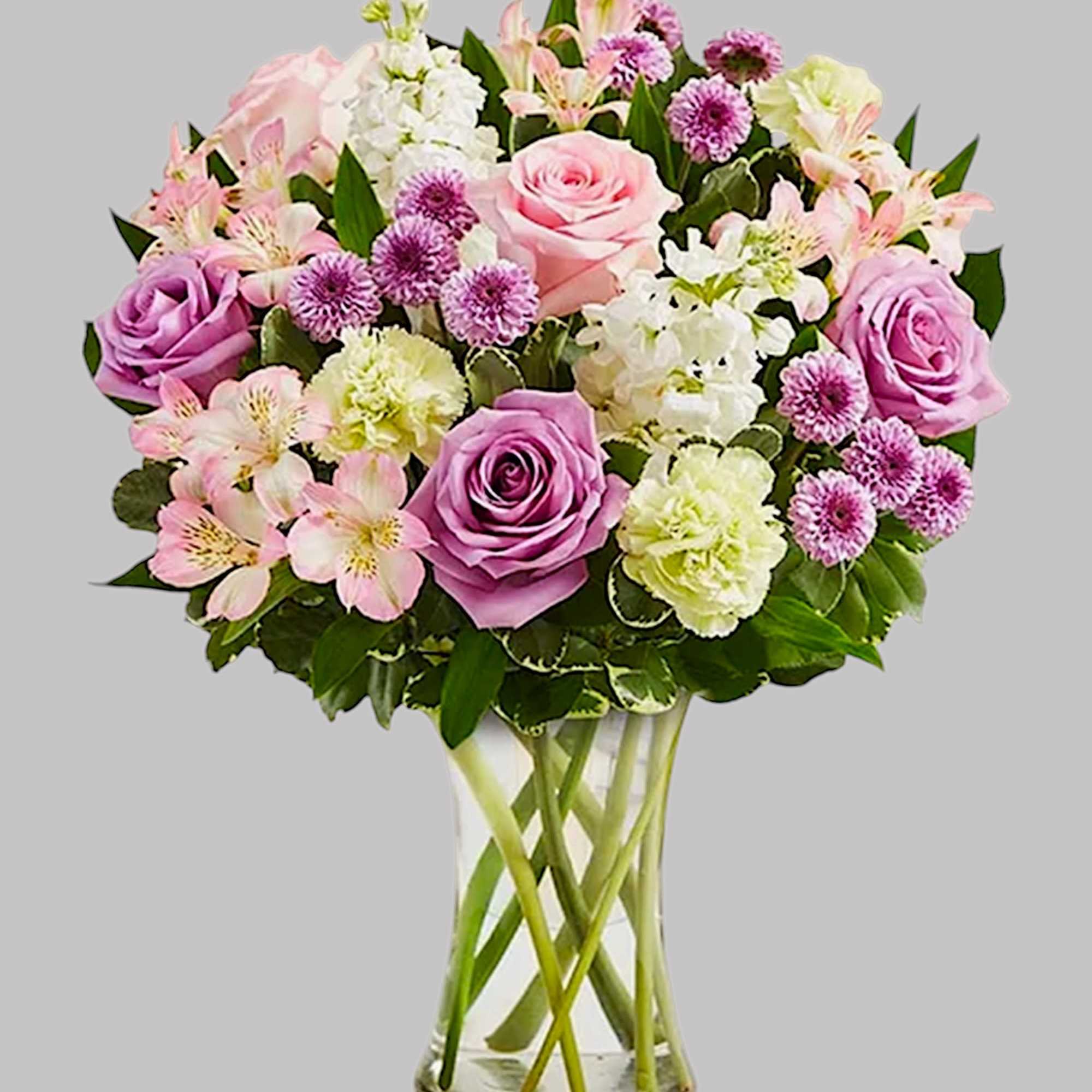 Pink and lavender bouquet in a clear glass vase, photo 6 of 6