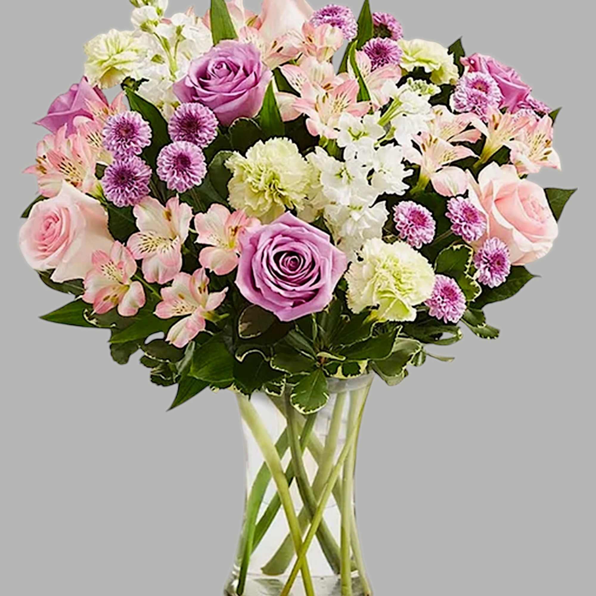 Pink and lavender bouquet in a clear glass vase, photo 6 of 6