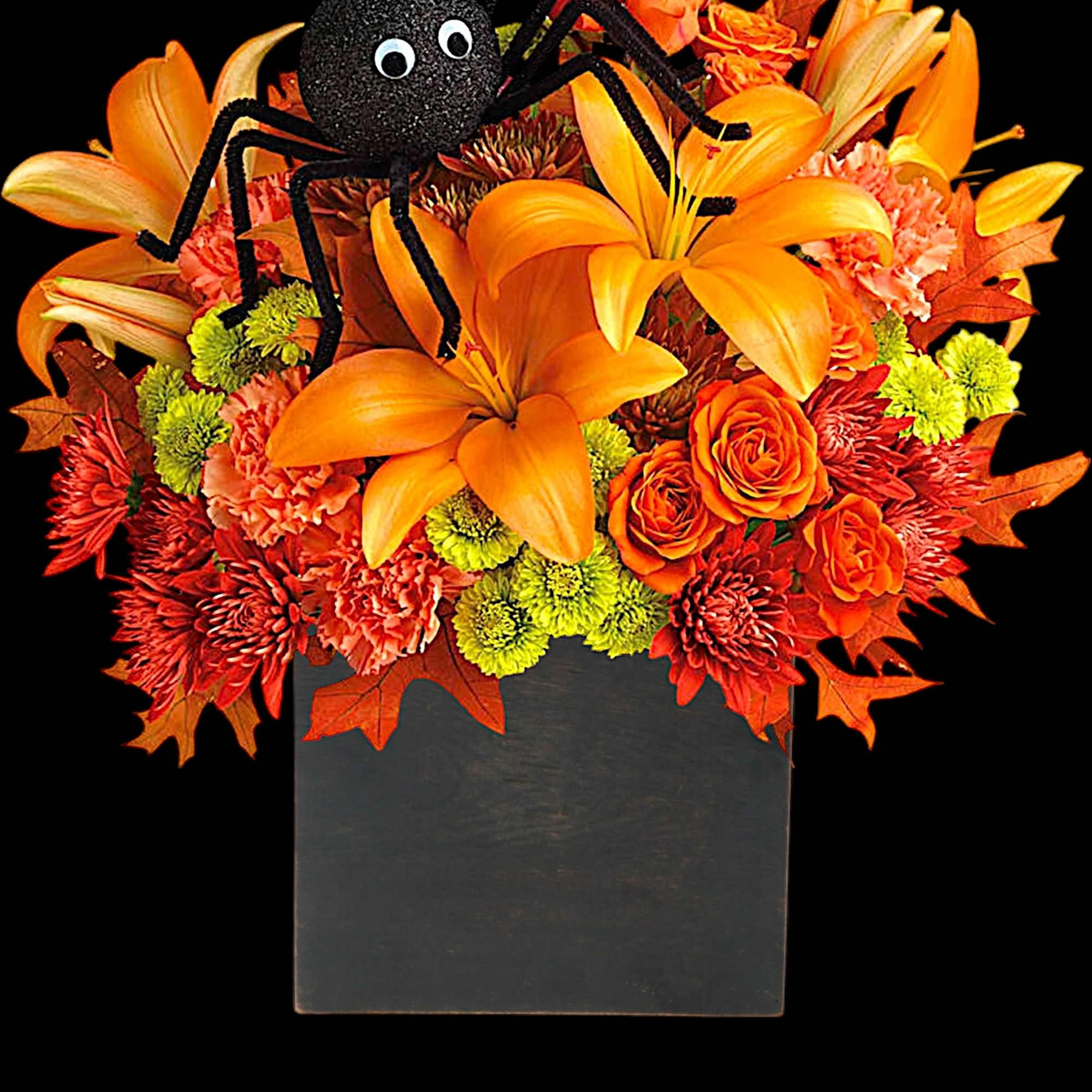 Orange floral arrangement with a black spider decoration in a dark box