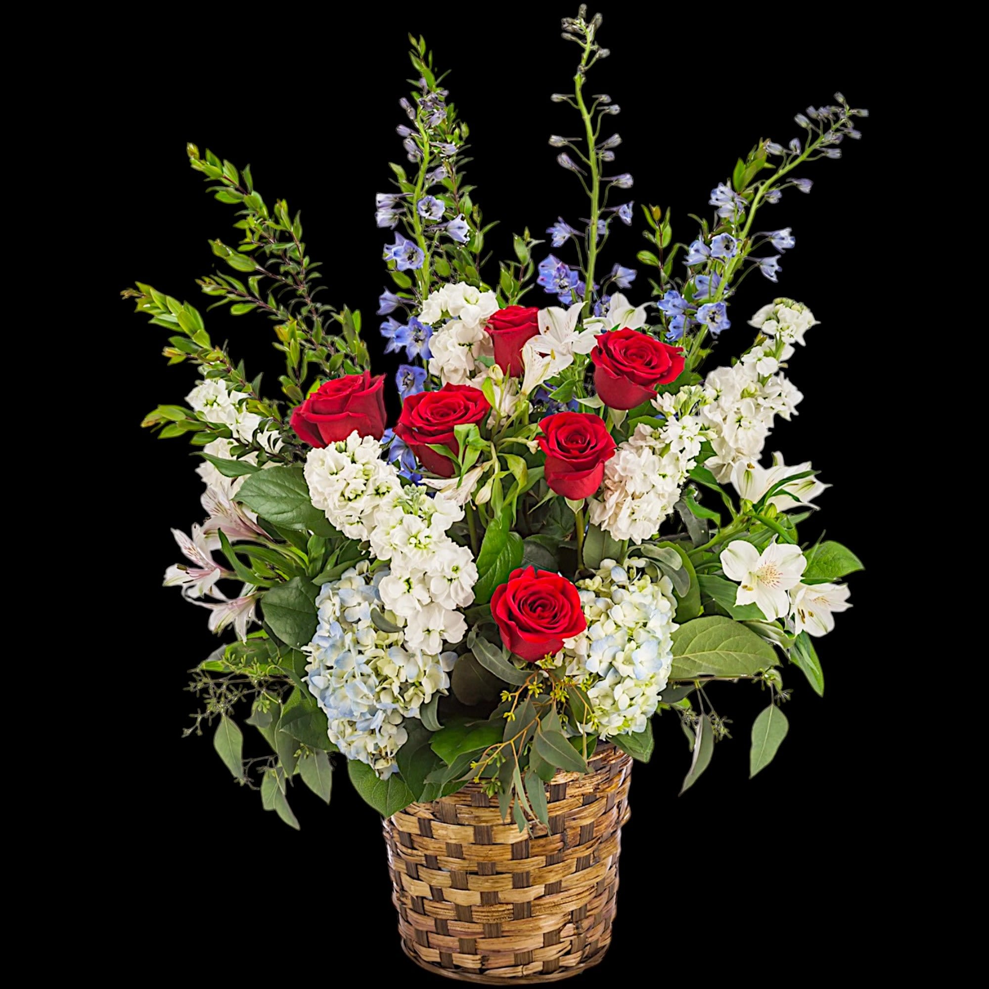 A red, white, and blue tribute flower basket featuring red roses, blue, photo 4 of 5