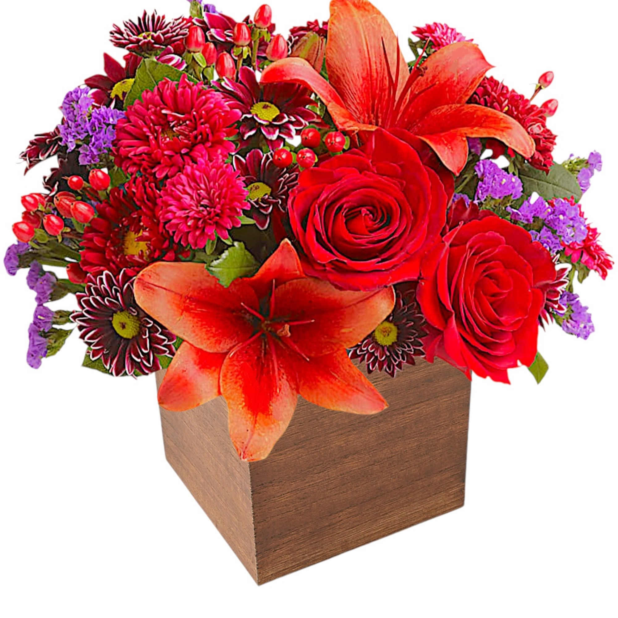 Red and orange floral arrangement in a wooden cube vase
