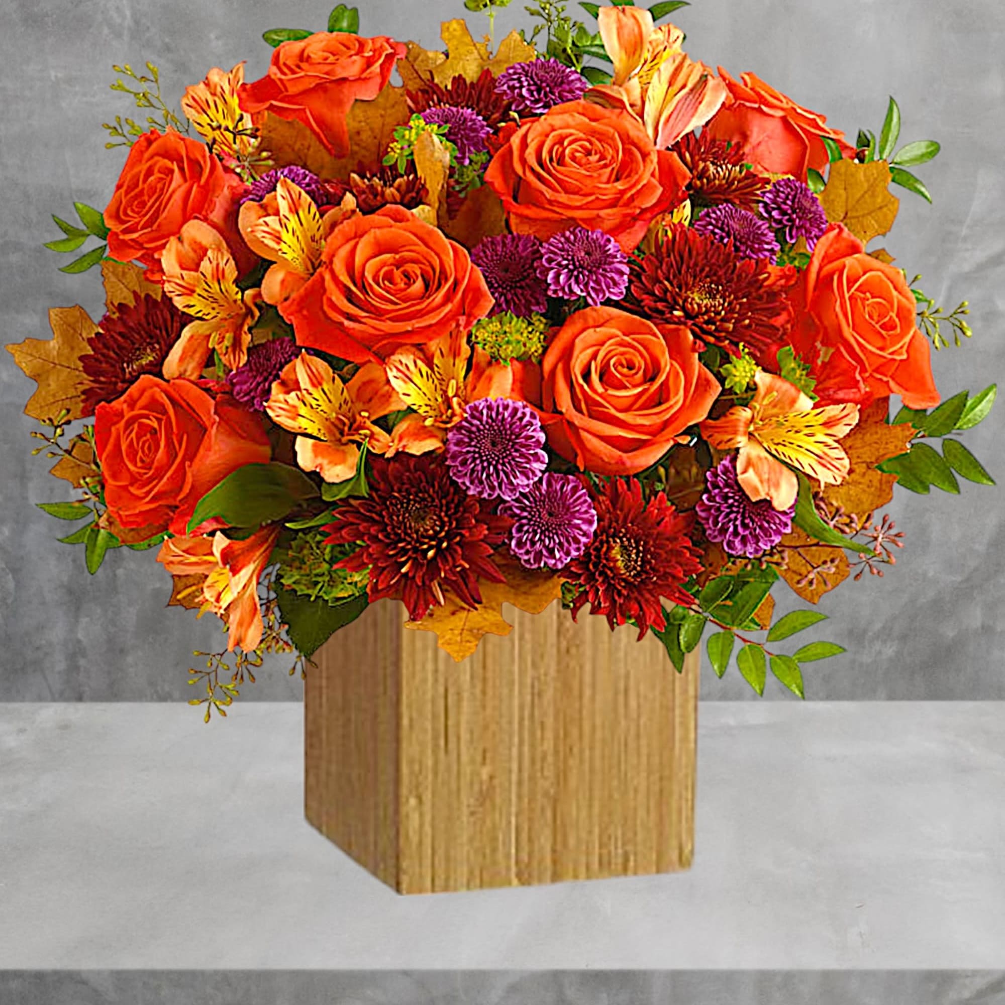 Orange roses and mixed fall flowers in a wooden cube vase, photo 3 of 3