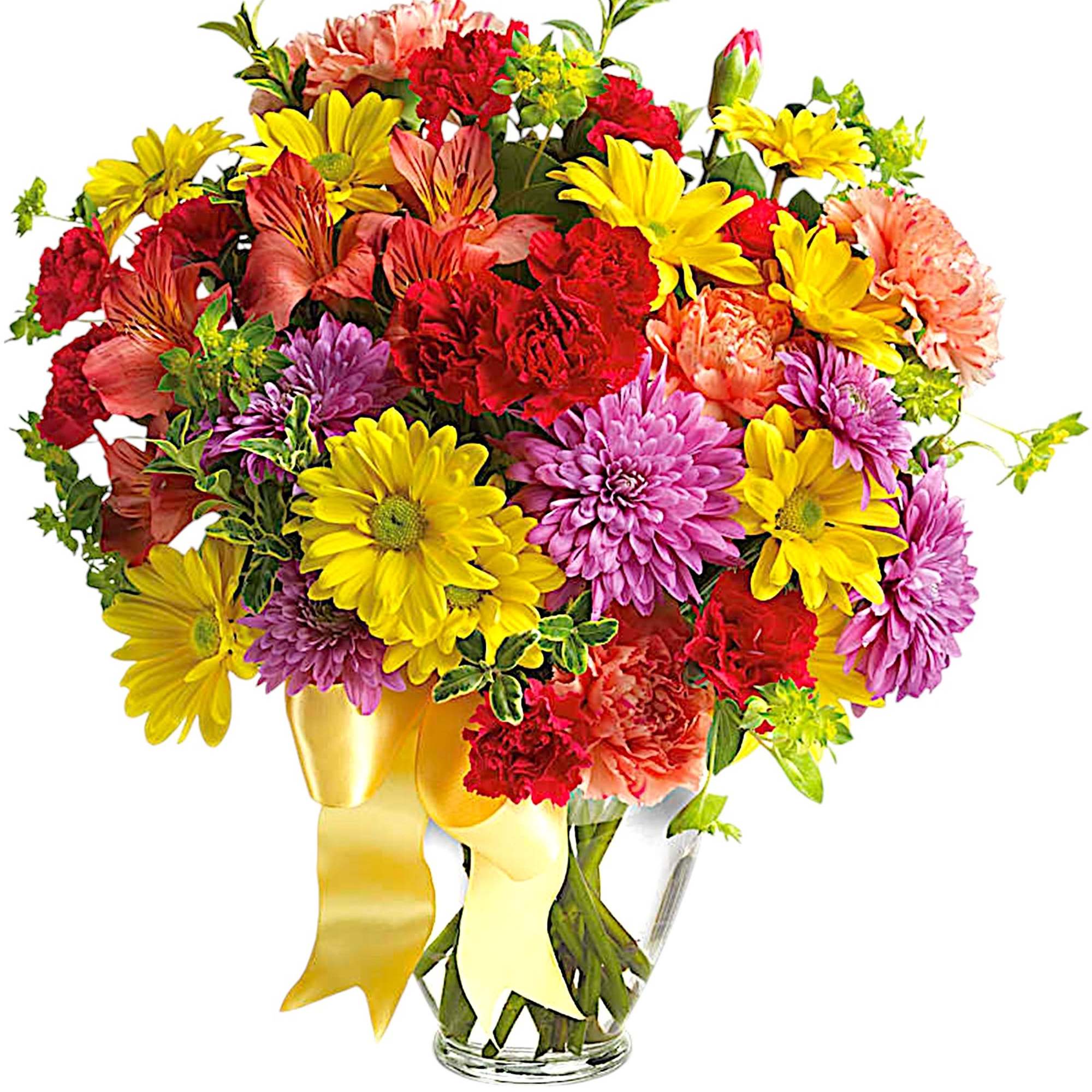 Mixed bouquet of yellow, pink, and red flowers in a glass vase with a yellow ribbon