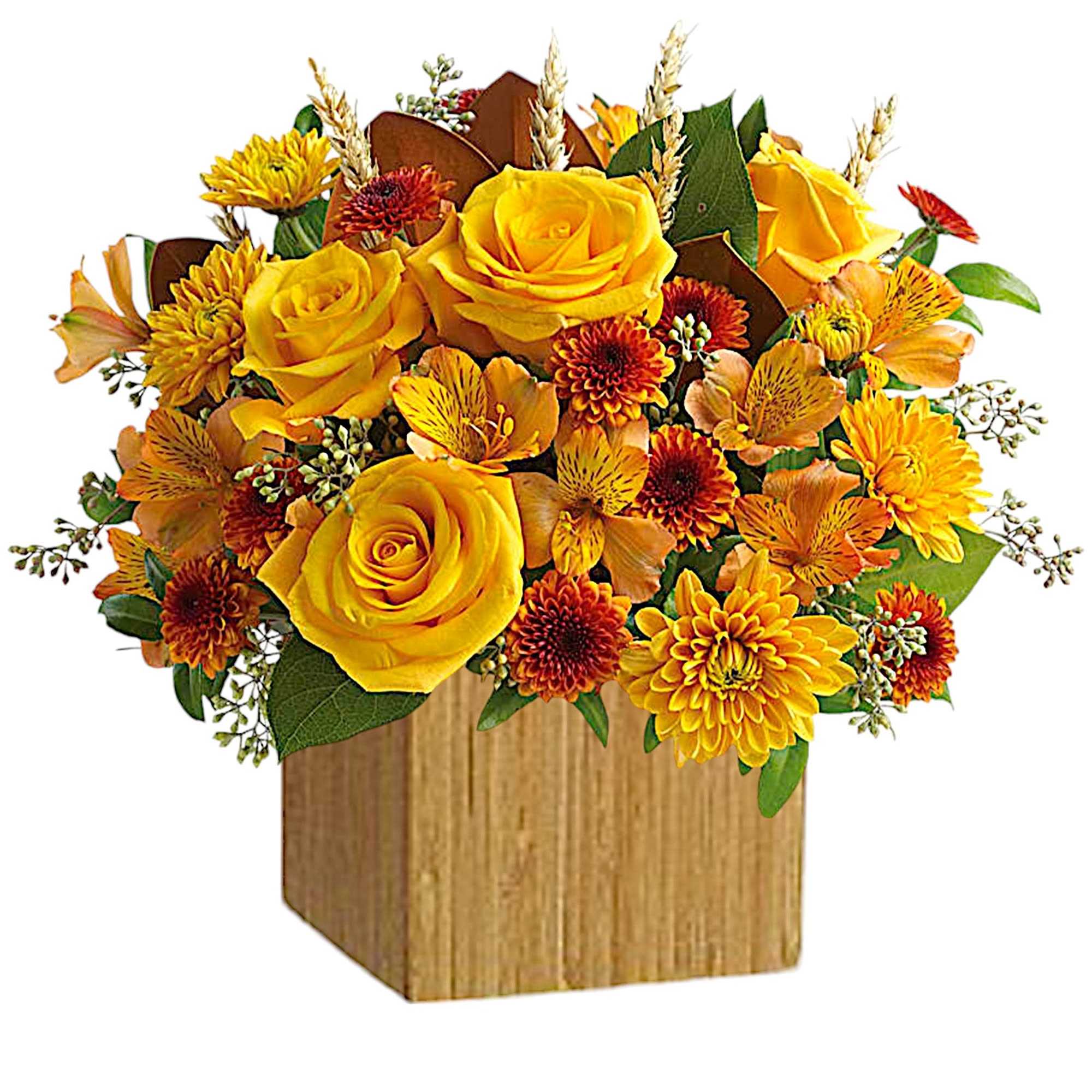 Yellow roses and orange mums arranged in a wooden box