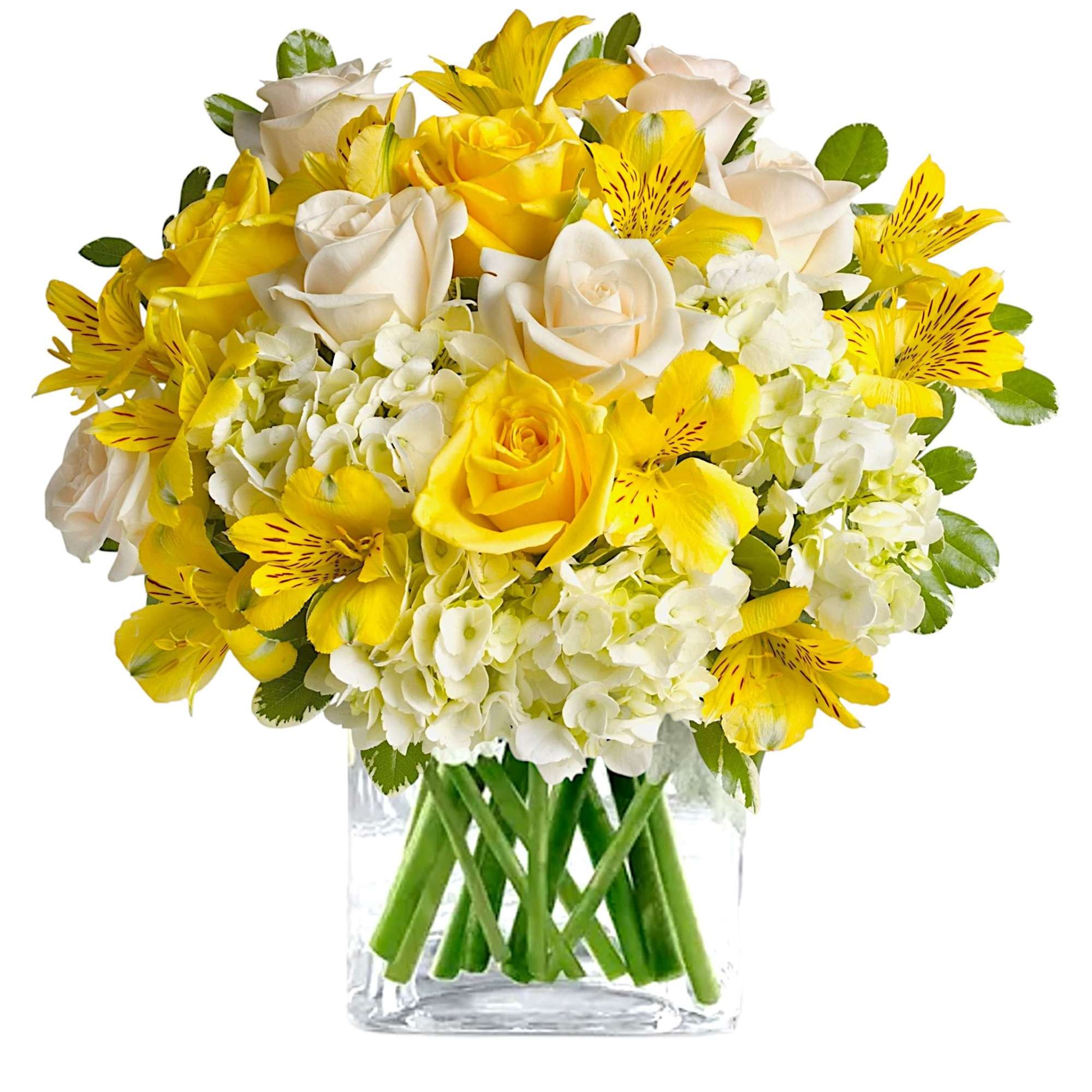 Yellow and white bouquet of roses and alstroemeria in a clear glass vase