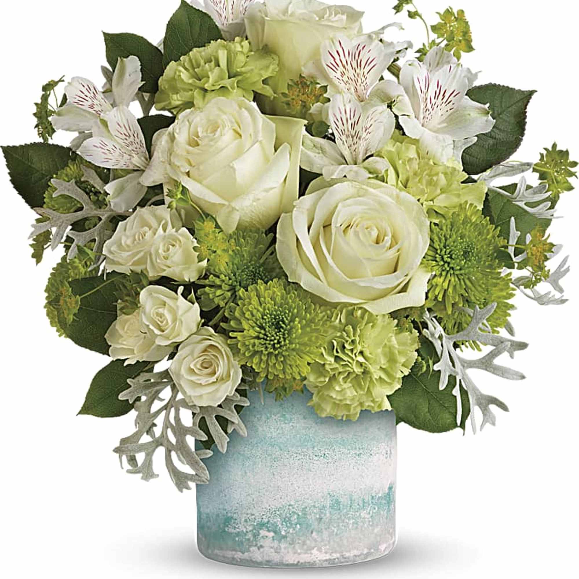 White roses and green flowers in a blue glass vase