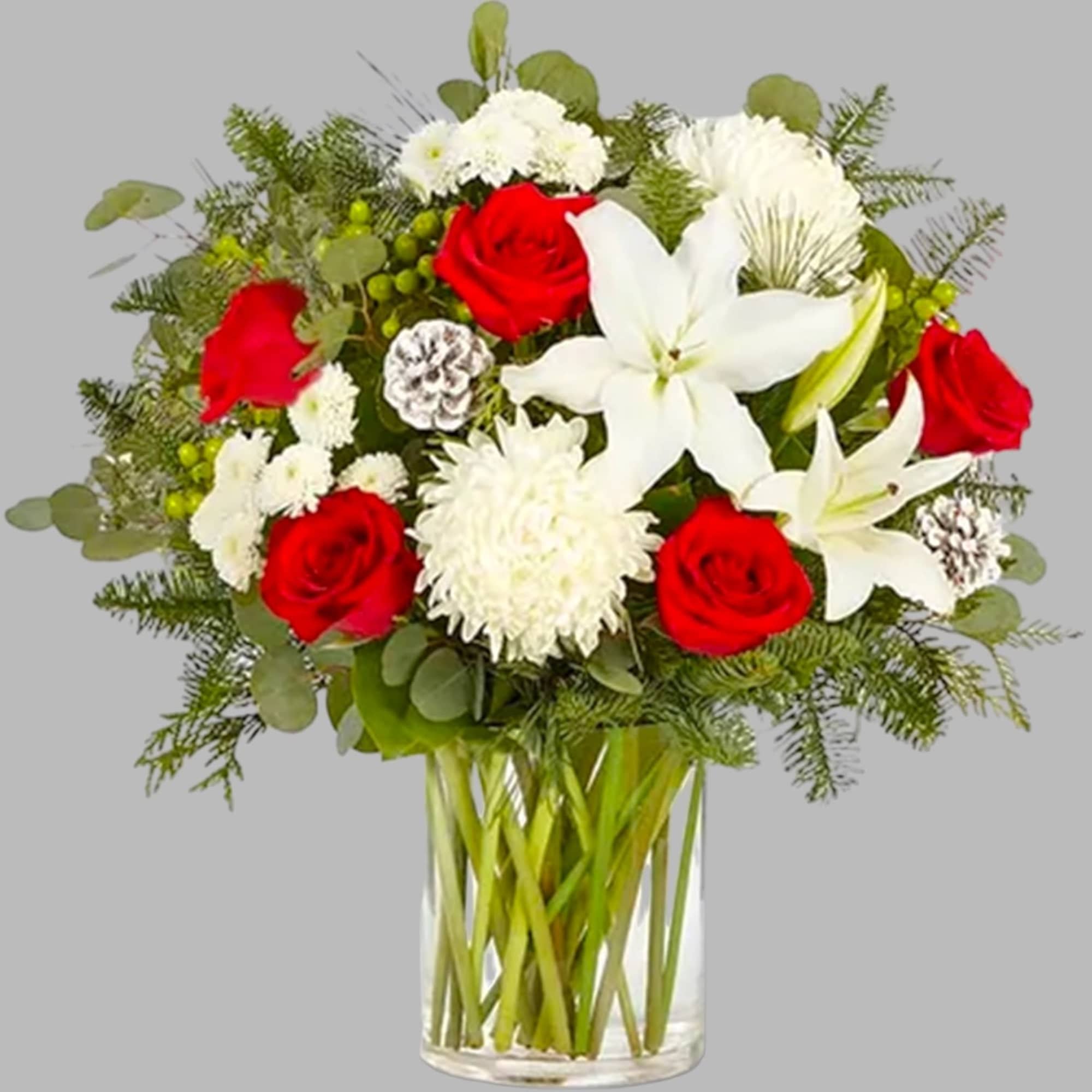 Red roses and white lilies in a clear glass vase, photo 4 of 4
