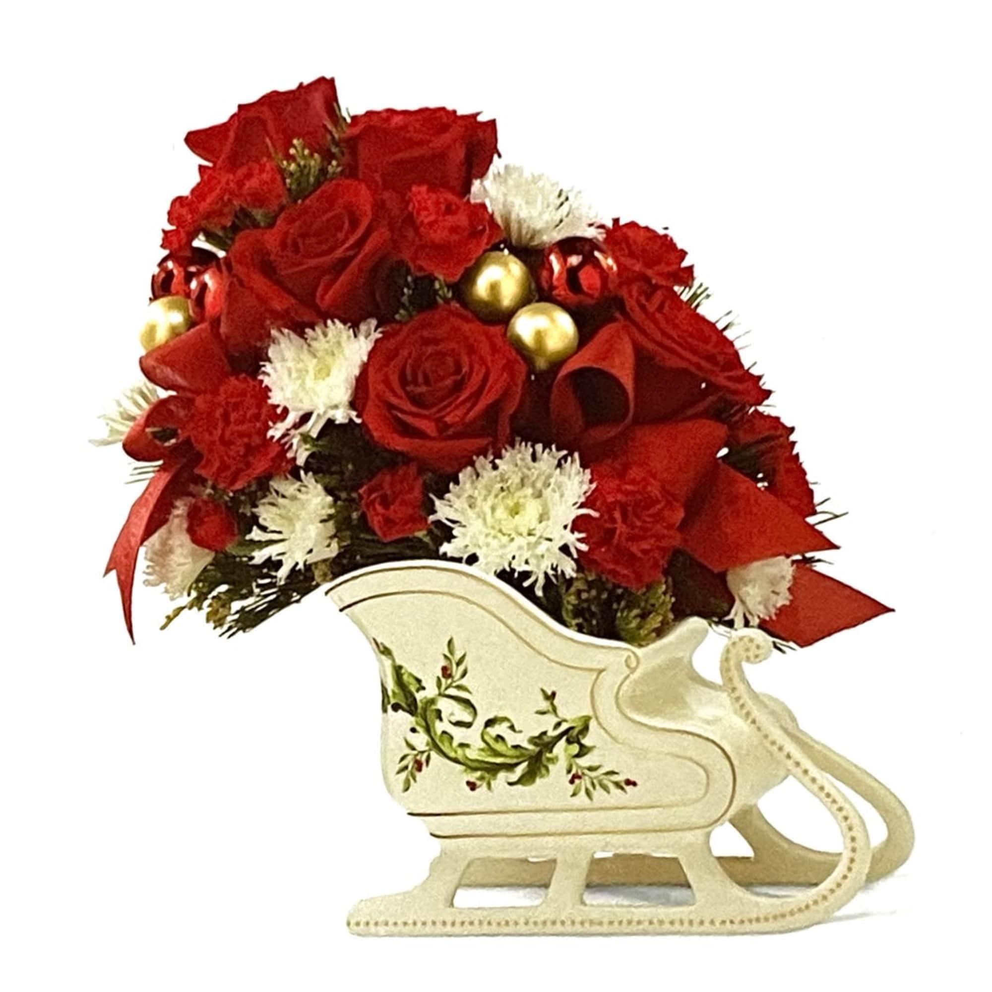 The Holiday Traditions Arrangement speaks to the beauty and magic of the