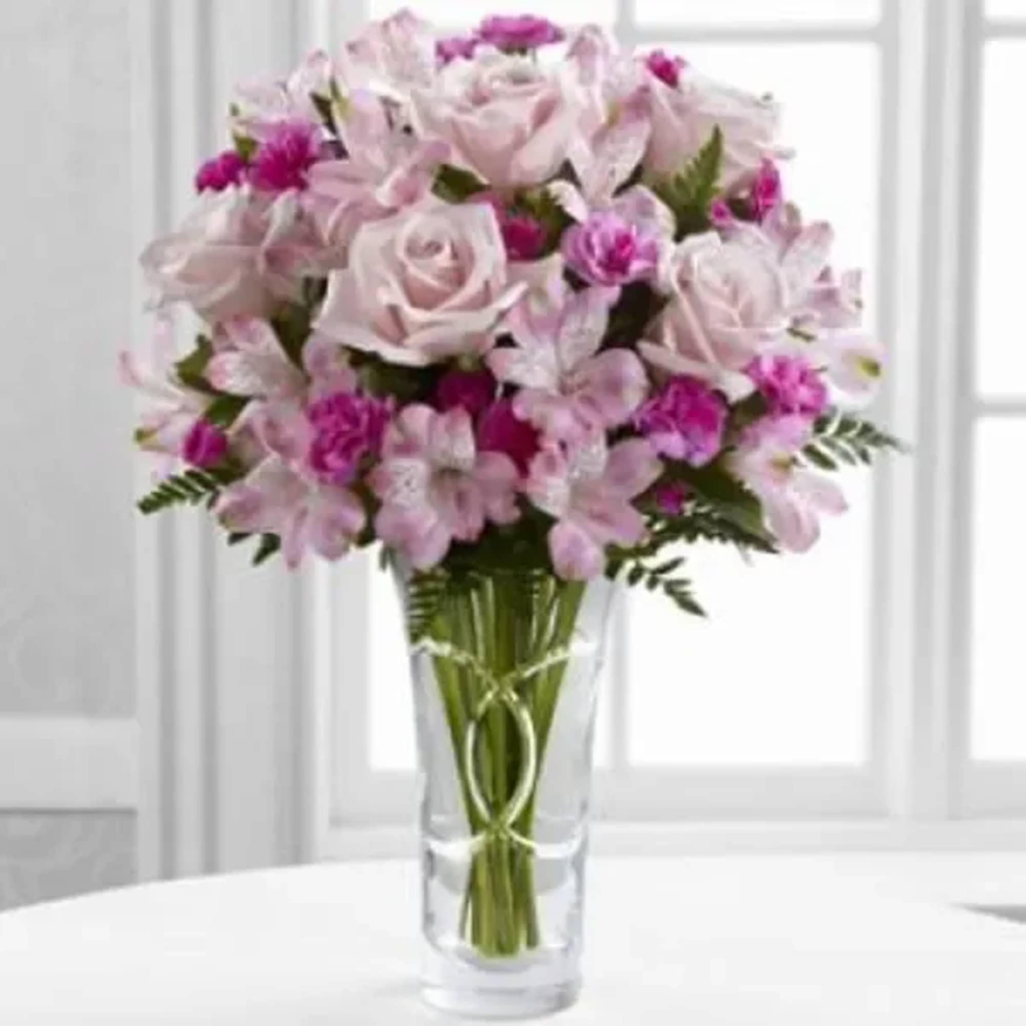 Make spring shimmer with this luxurious pink arrangement, hand-delivered in a glass, photo 2 of 2