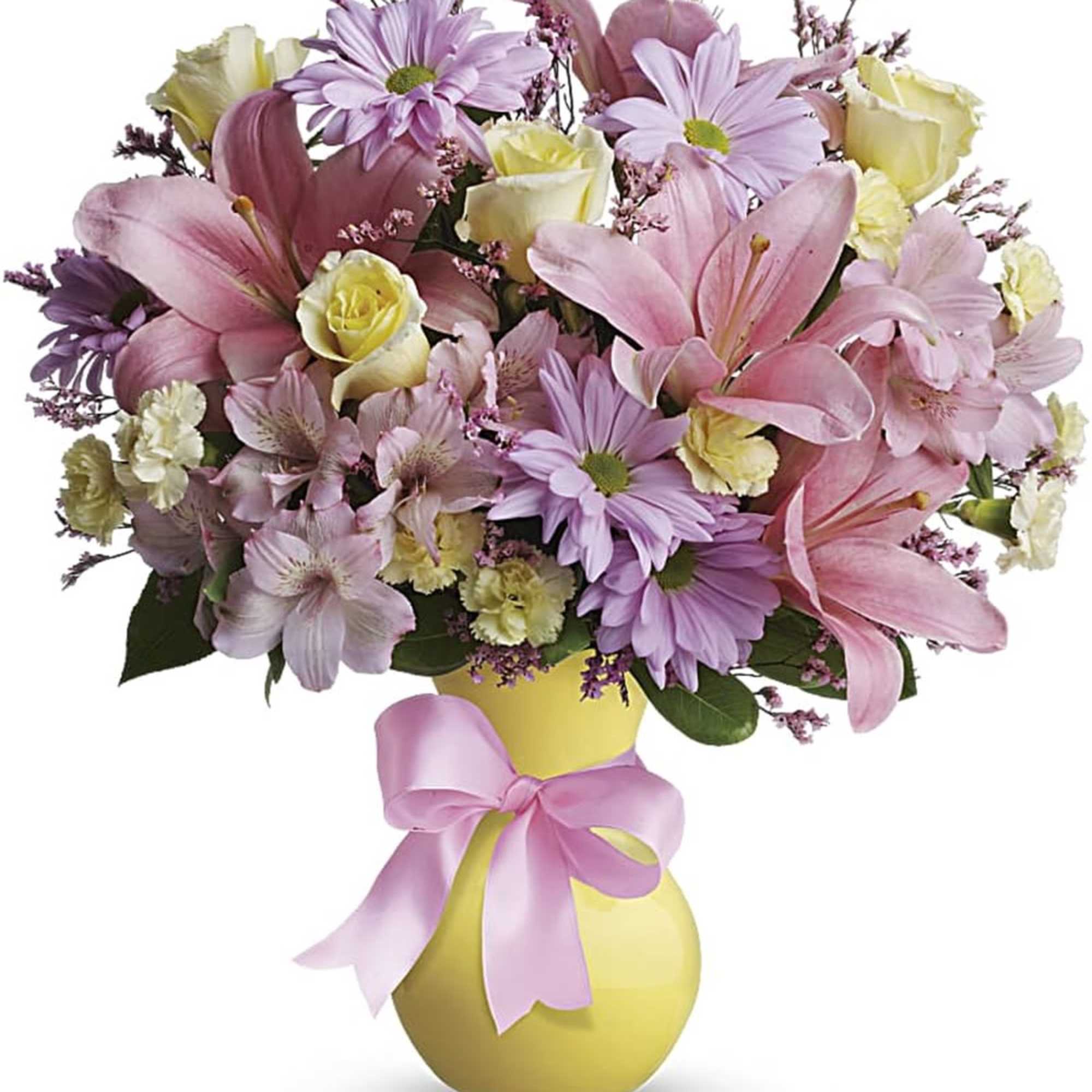 Pink and lavender bouquet with roses and lilies in a yellow vase