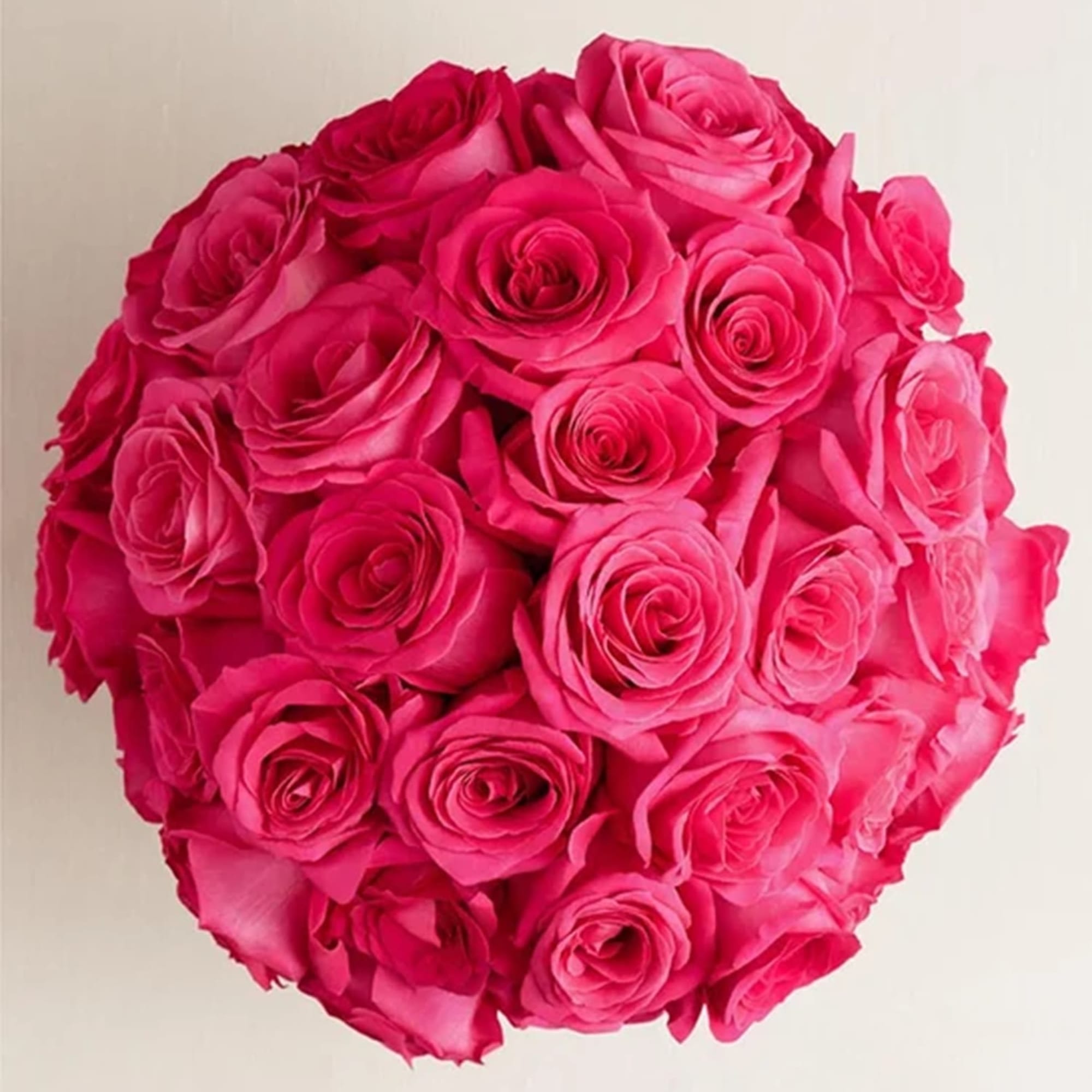 Round bouquet of bright pink roses