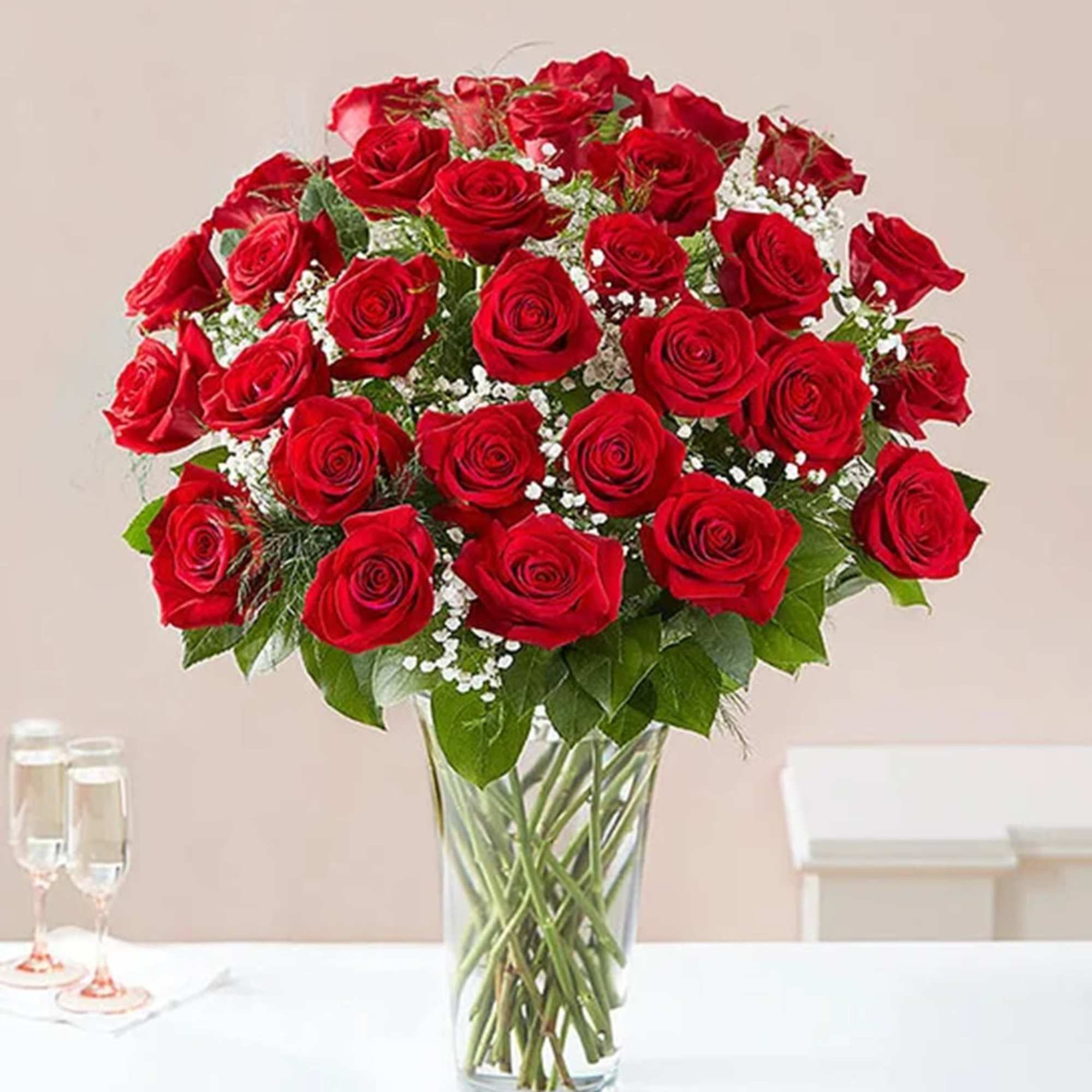 Bouquet of red roses in a clear glass vase