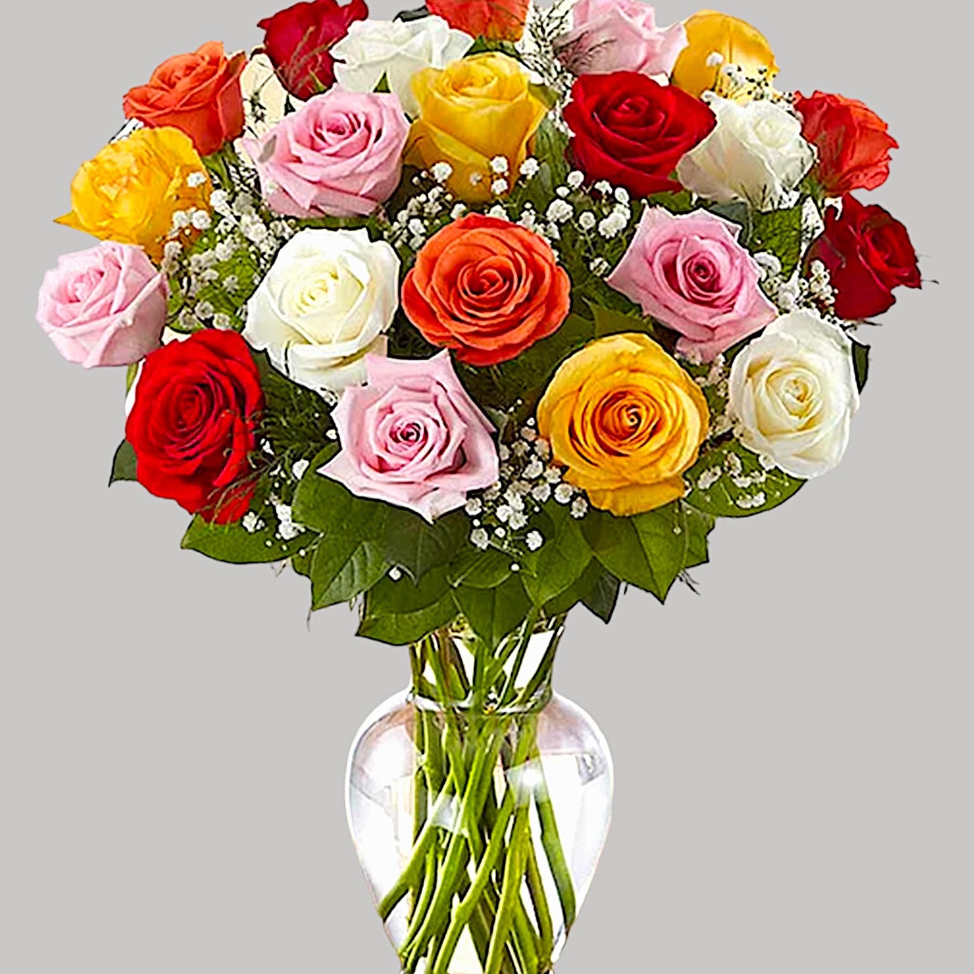 Mixed roses in a clear glass vase with baby's breath, photo 5 of 5