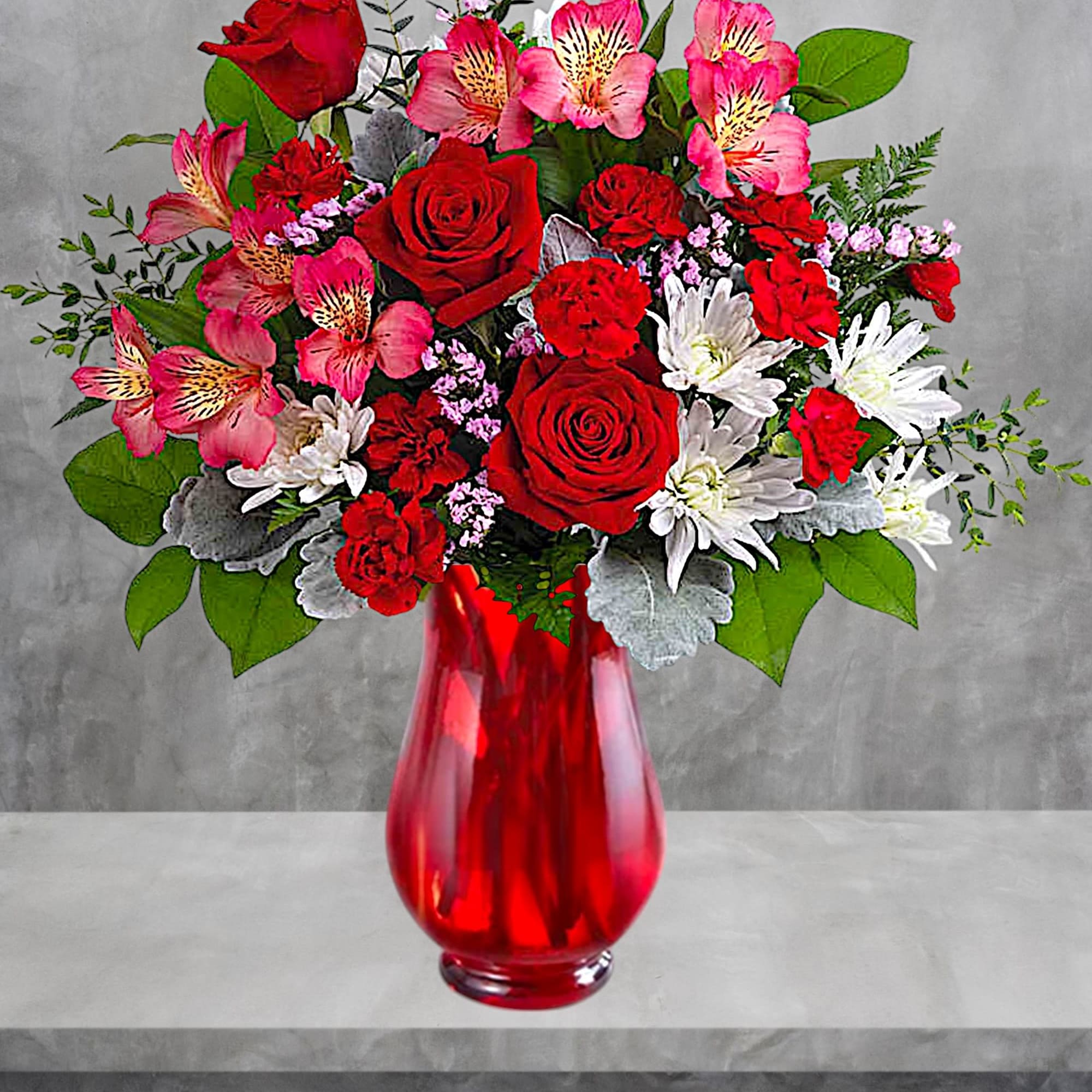 Honor the beauty of true love with this vibrant flower arrangement of