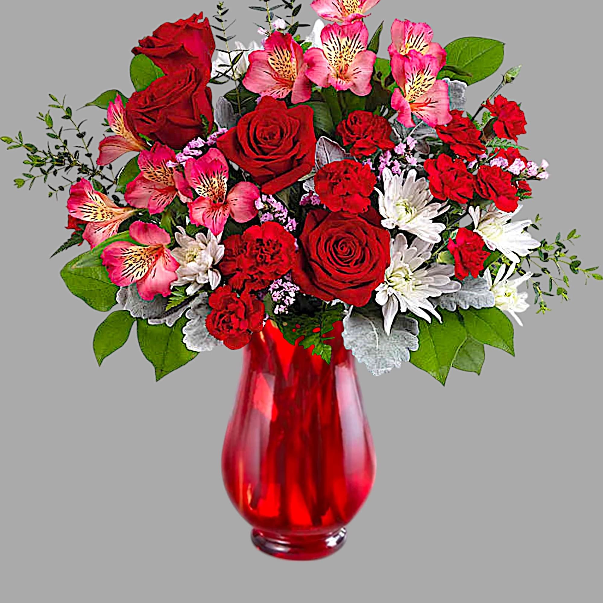 Red roses and pink alstroemeria in a red glass vase, photo 4 of 4
