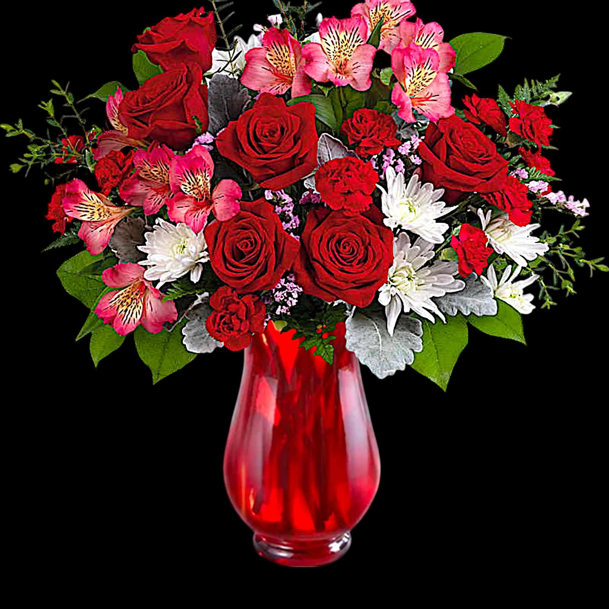 Red roses and pink flowers arranged in a red glass vase, photo 3 of 4