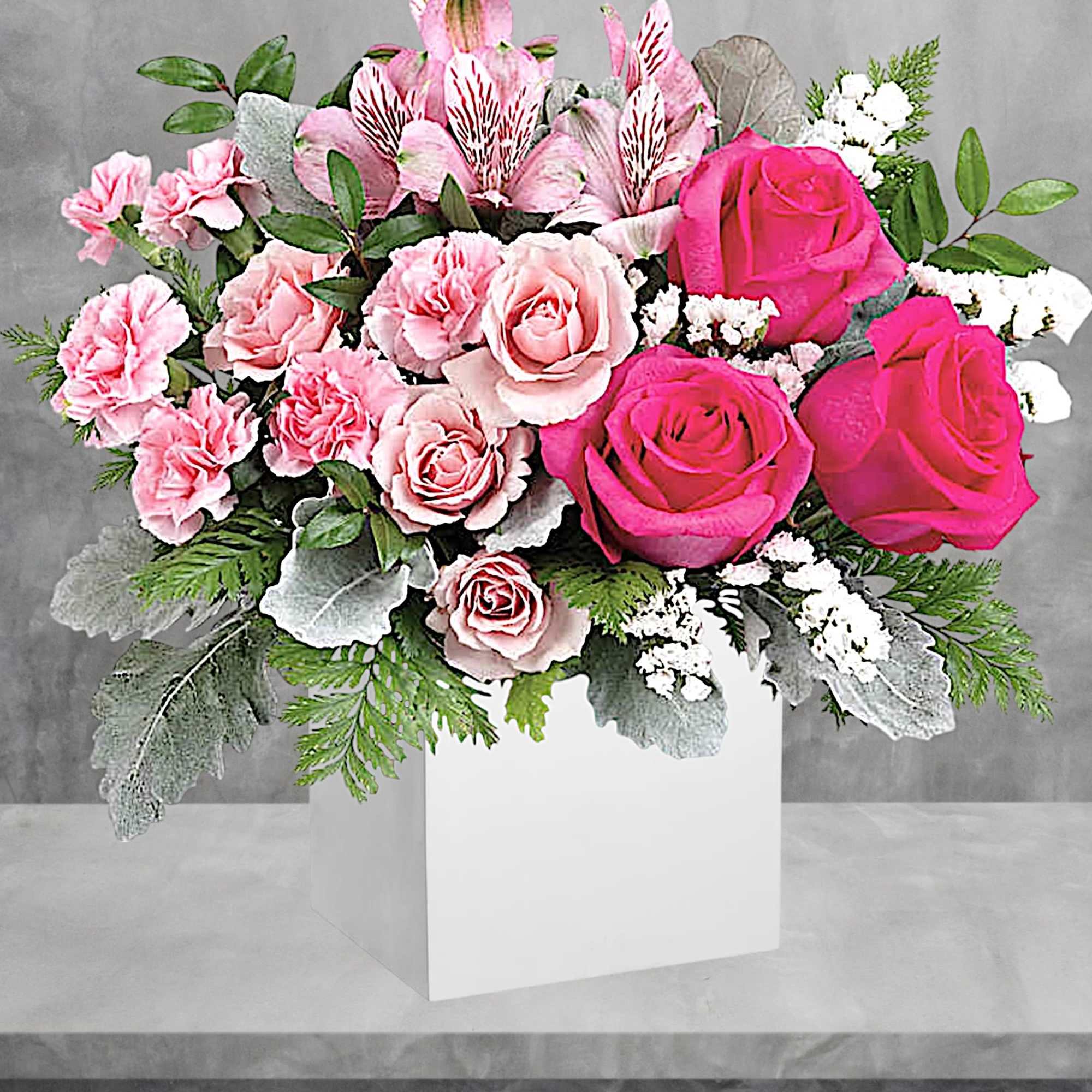 Keep them blushing with the most beautiful pink flower arrangement, elegantly displayed