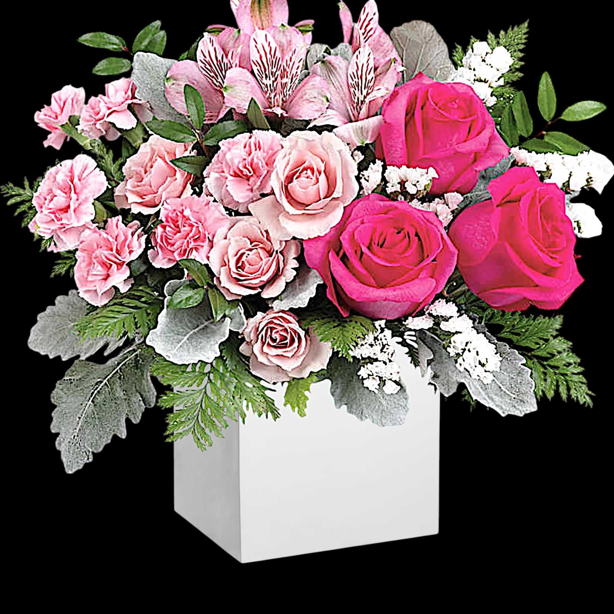 Pink roses and carnations in a white square vase