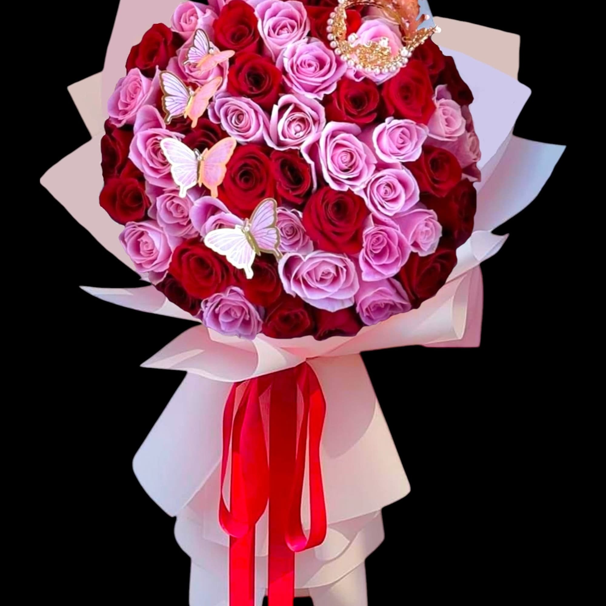 Bouquet of red and pink roses with butterfly decorations and a red ribbon, photo 4 of 5