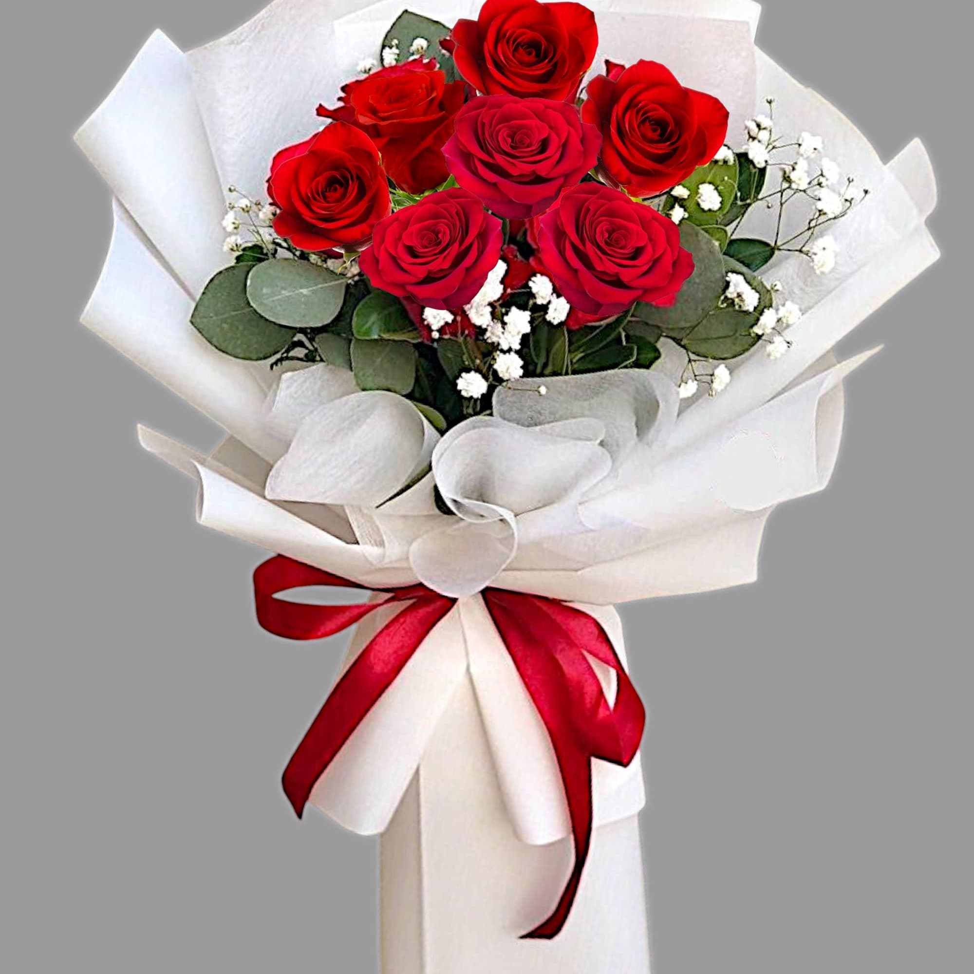 Bouquet of red roses wrapped in white paper with a red ribbon, photo 4 of 4
