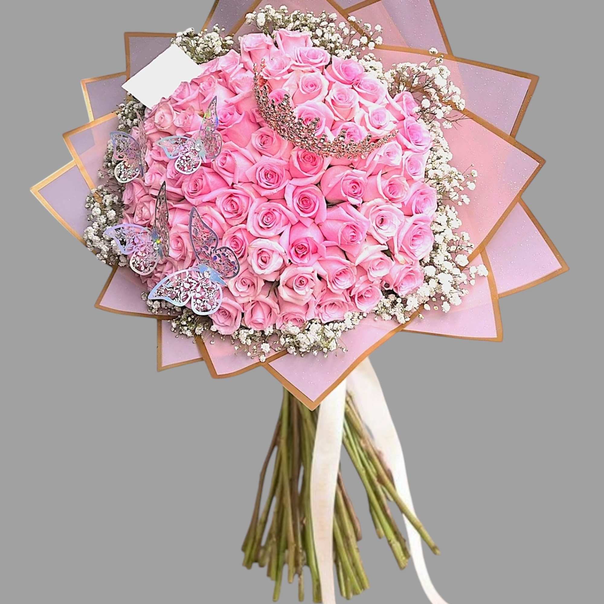 Pink rose bouquet with baby’s breath and butterfly decorations, photo 5 of 5