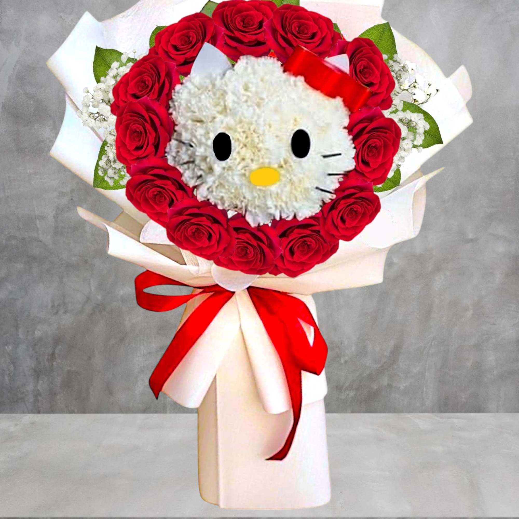 Red rose bouquet with a Hello Kitty face centerpiece and red ribbon