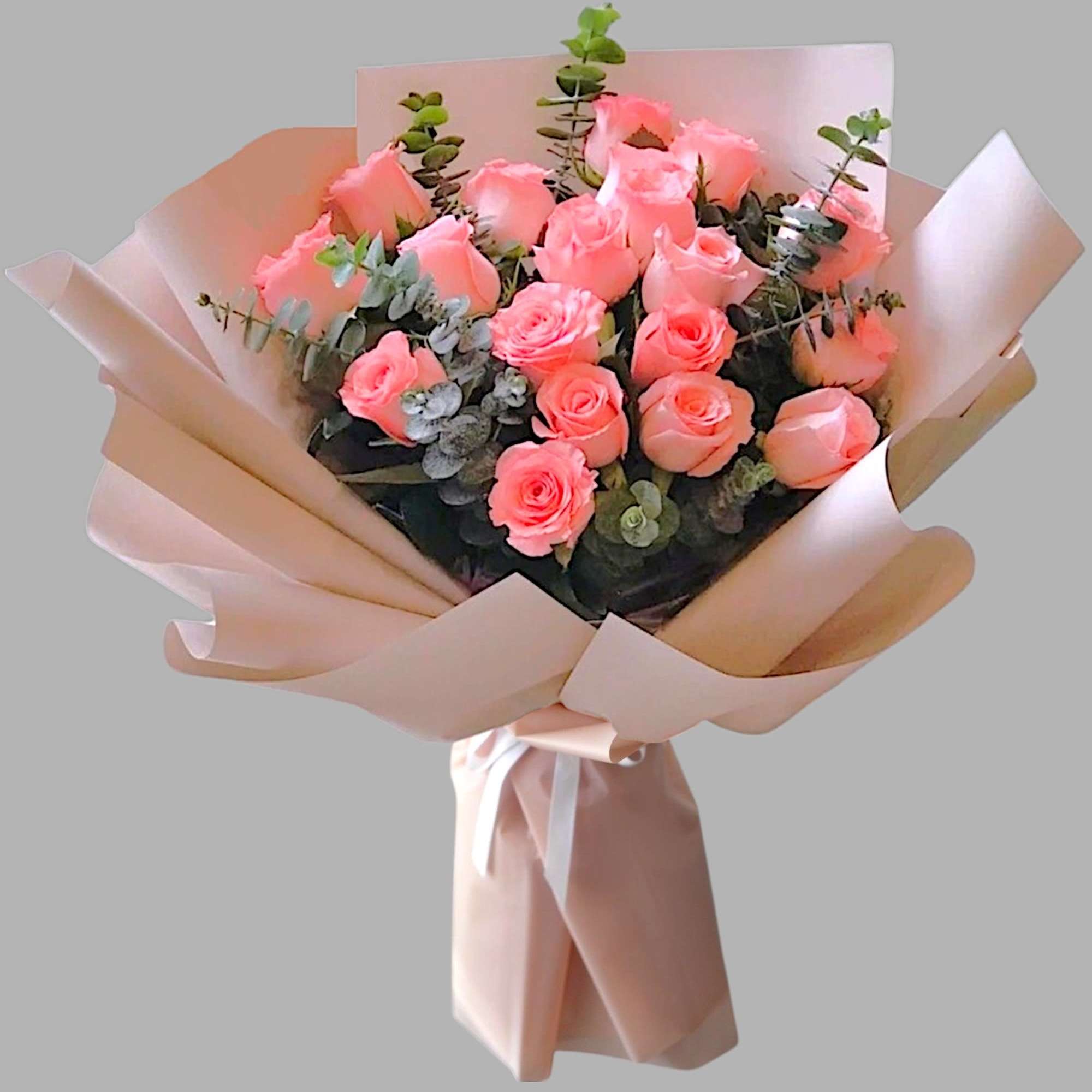 Bouquet of pink roses wrapped in pale paper, photo 4 of 4