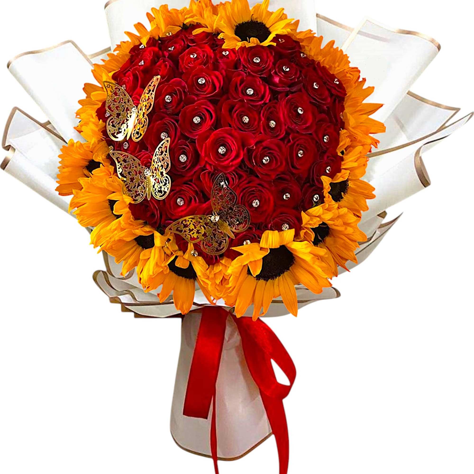 Bouquet of red roses and yellow sunflowers with a red ribbon