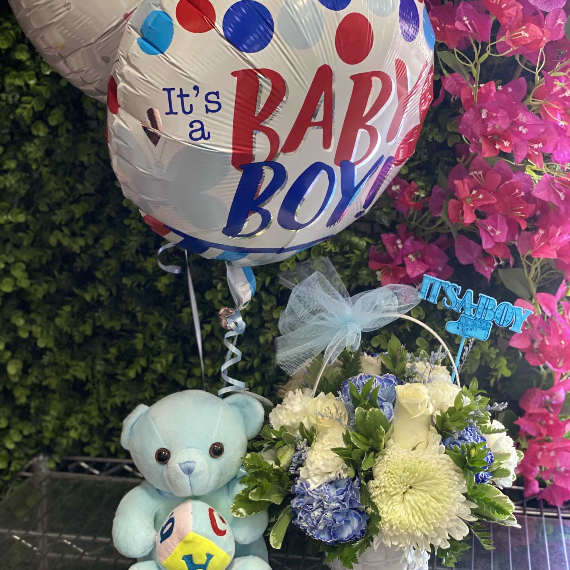 Baby boy balloon with a teddy bear and a small flower basket