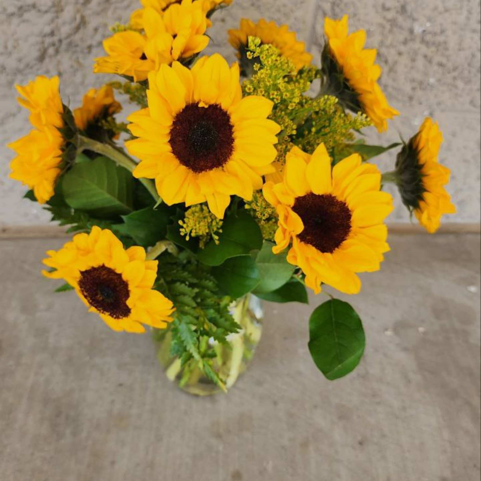Sunflower bouquet in a clear glass vase