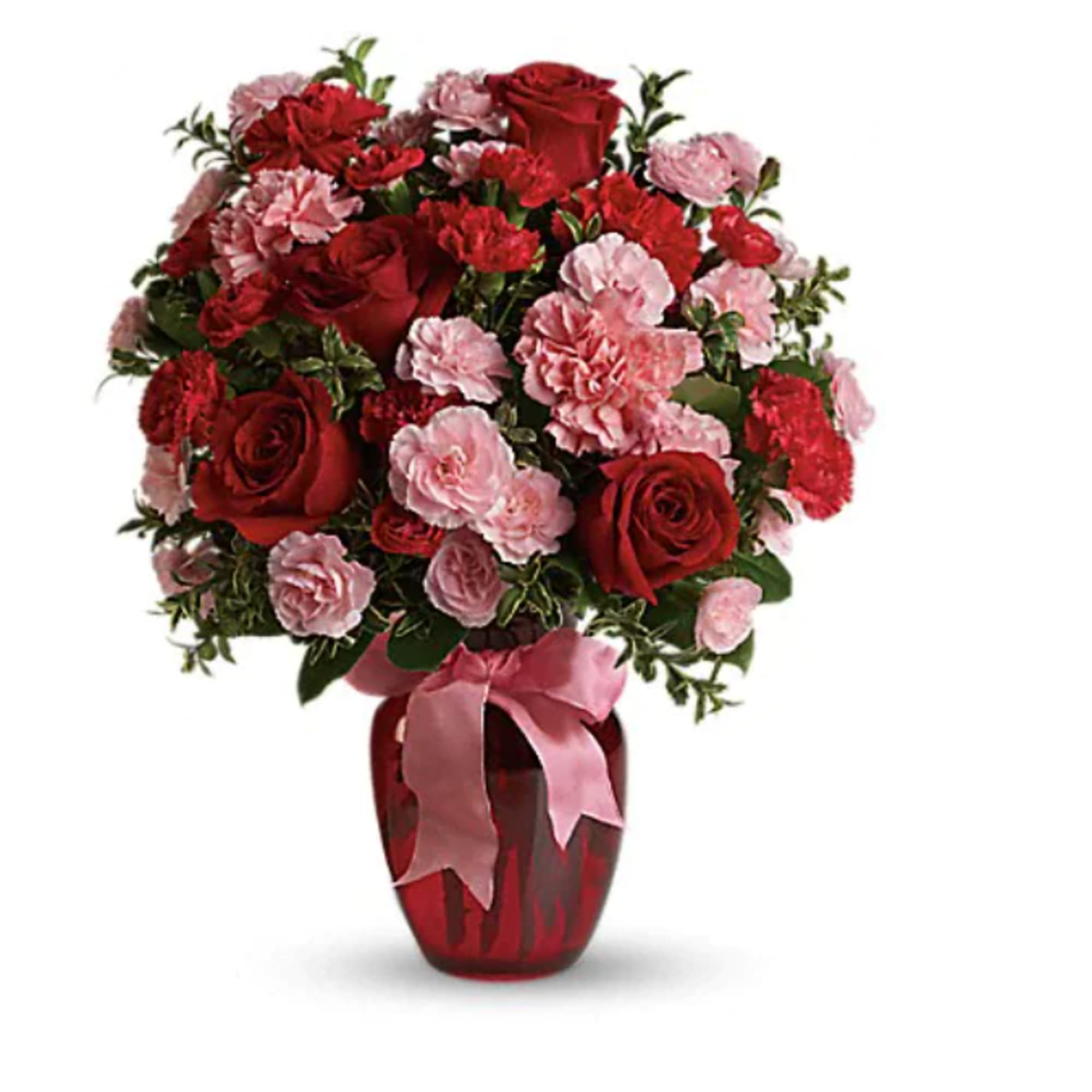 Red roses and pink carnations in a red vase with a pink ribbon