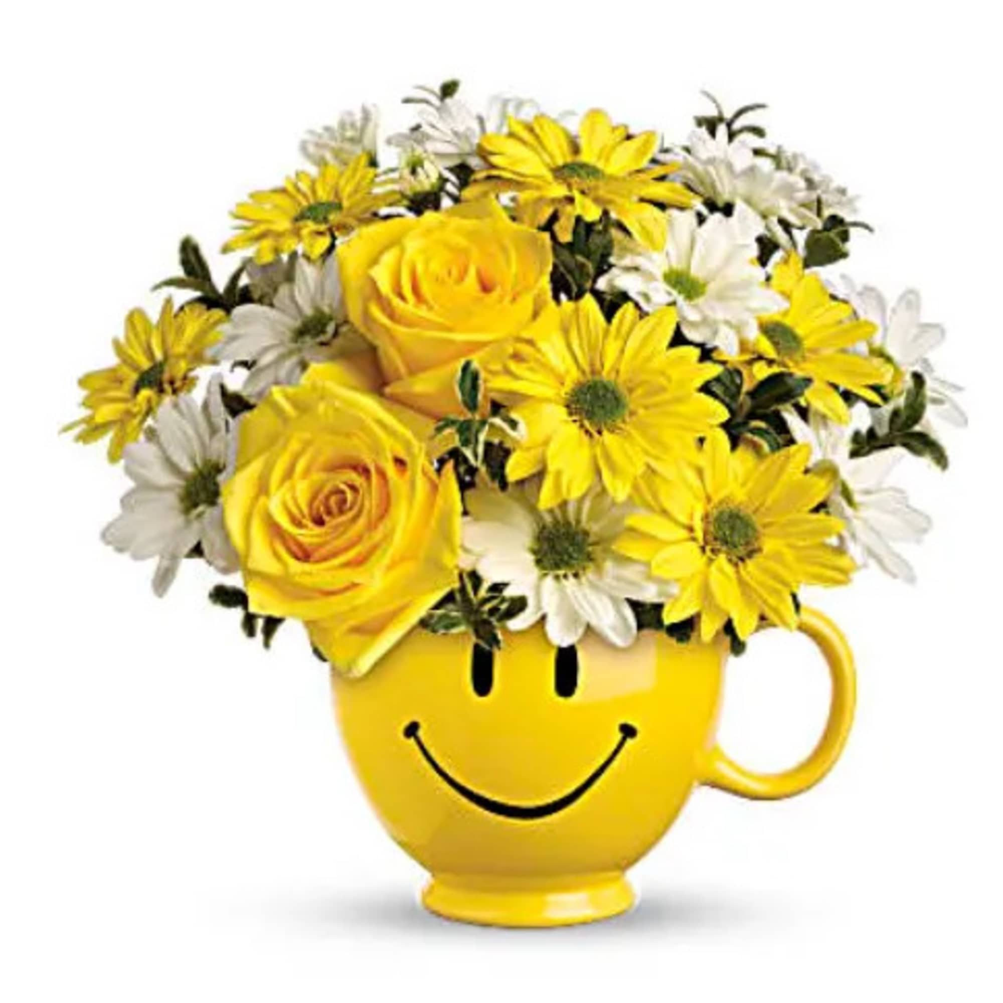 Yellow roses and white daisies in a smiley-face mug