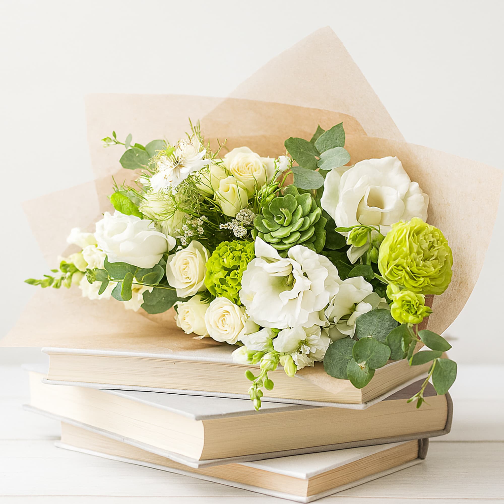 Verano Verde" Wrapped Bouquet
A serene blend of elegance and freshness, our Verano, photo 2 of 2