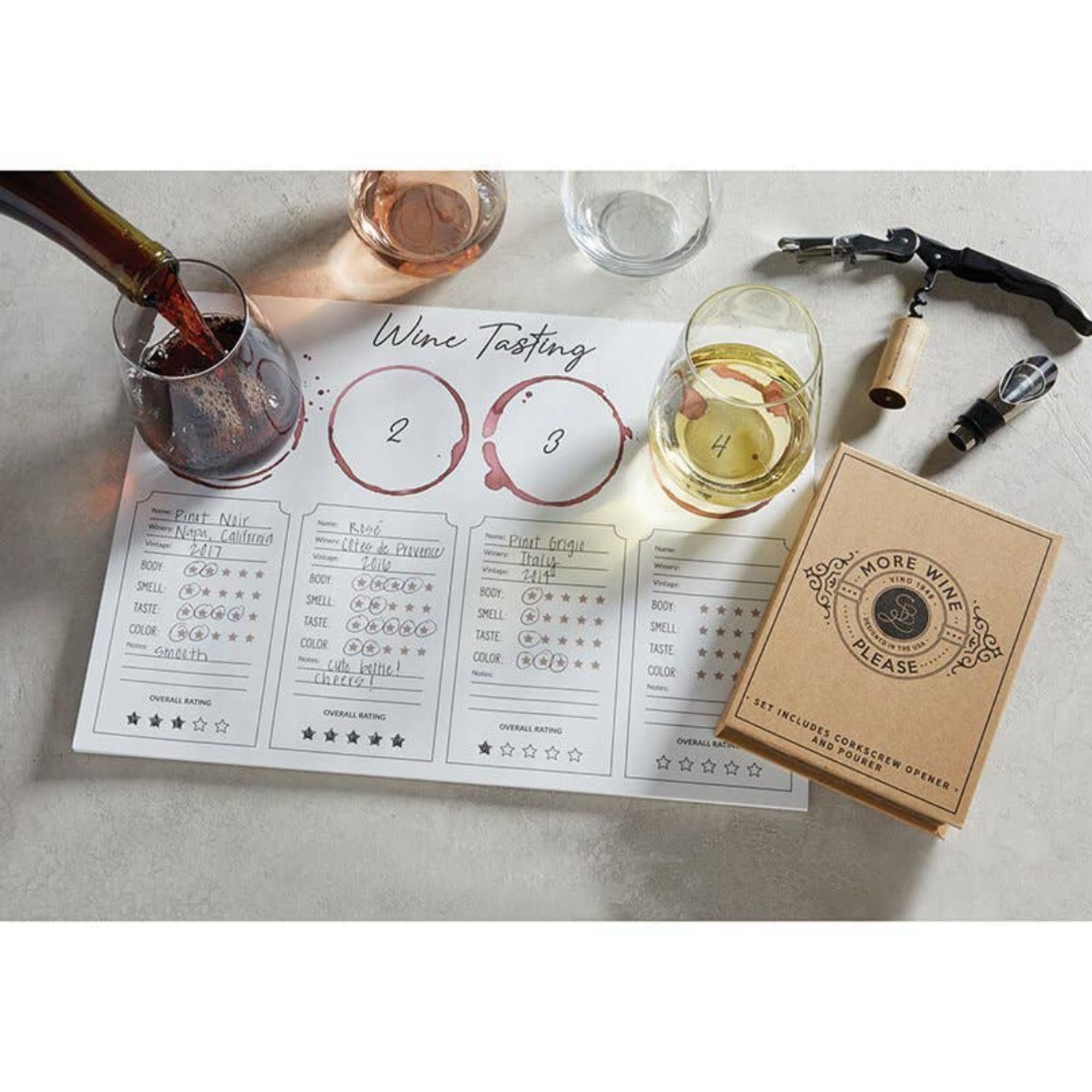 Wine tasting kit with glasses, corkscrew, and score sheets