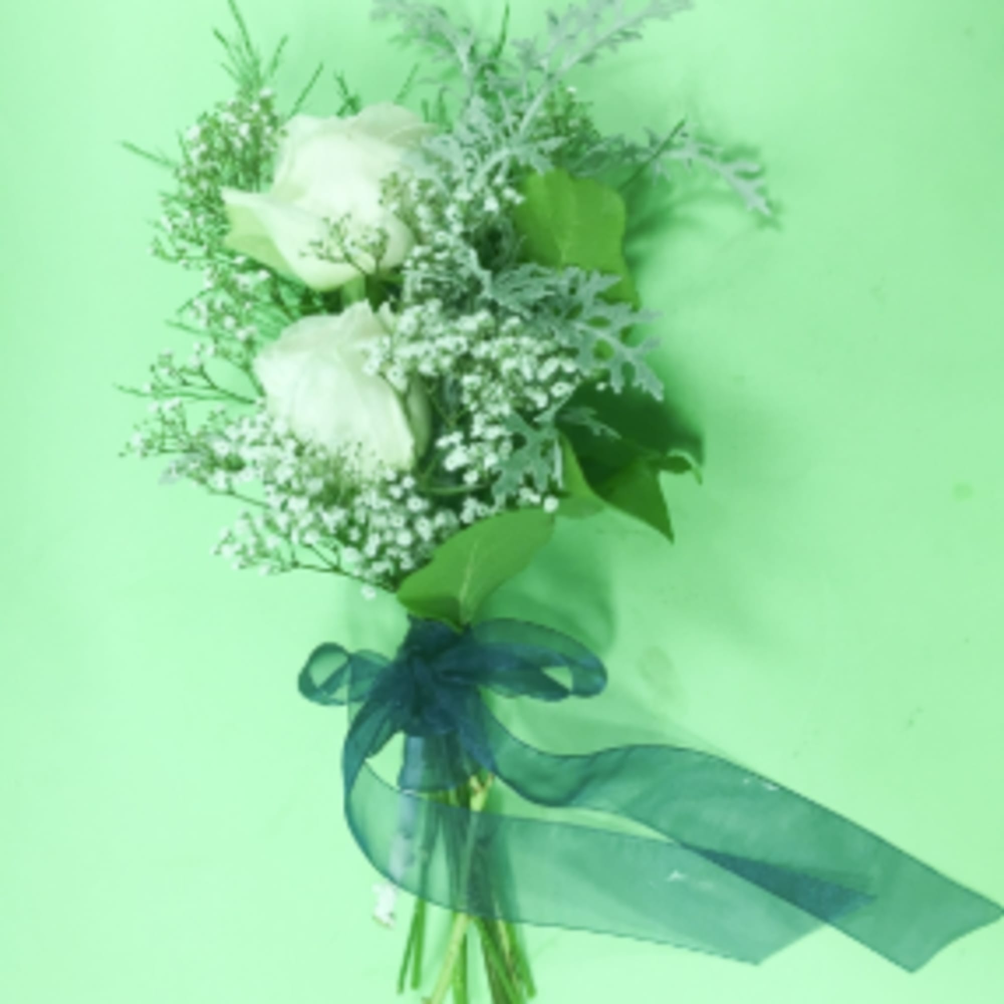 White rose bouquet with baby's breath and a blue ribbon