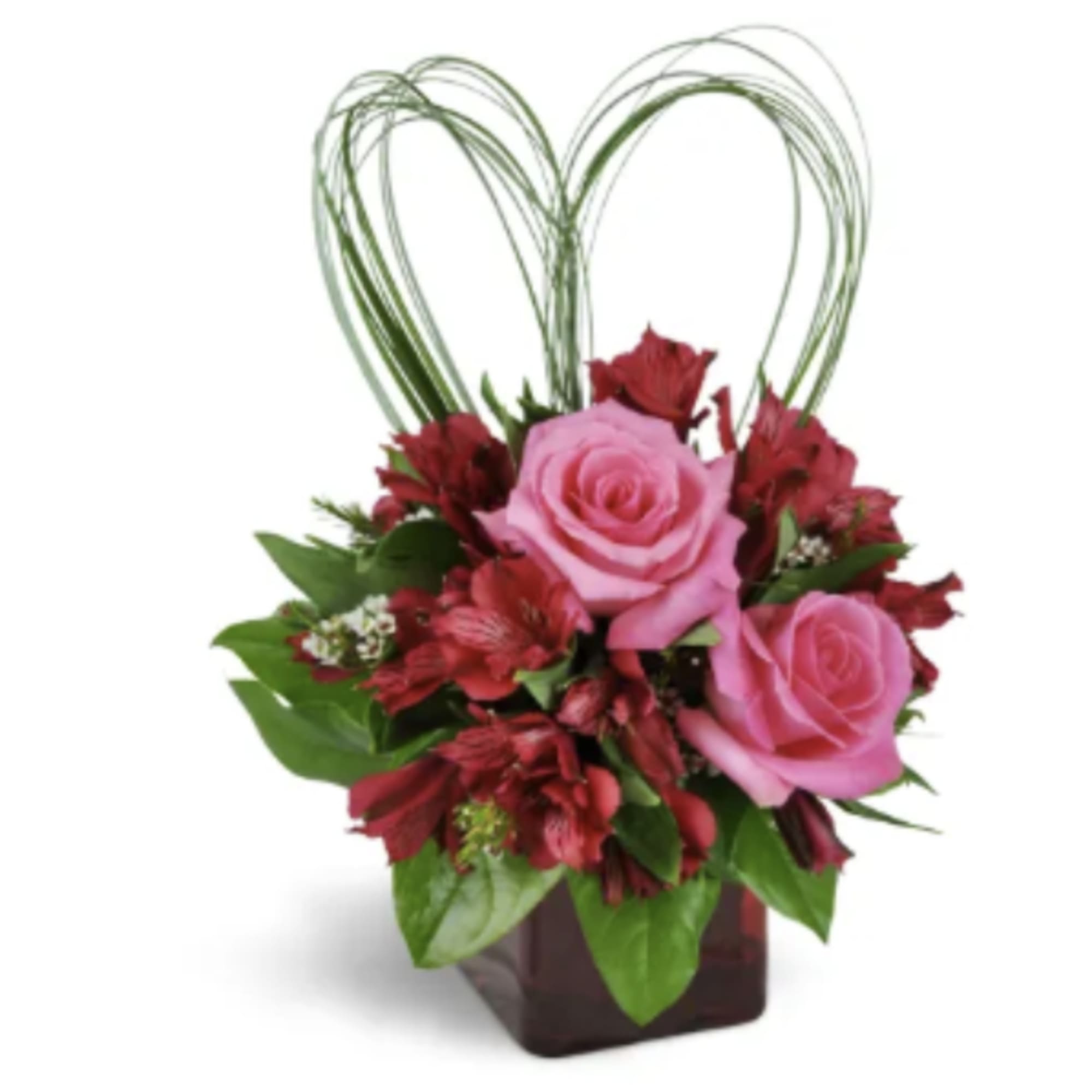 Sweet, stylish, and full of romance, this arrangement features soft pink roses