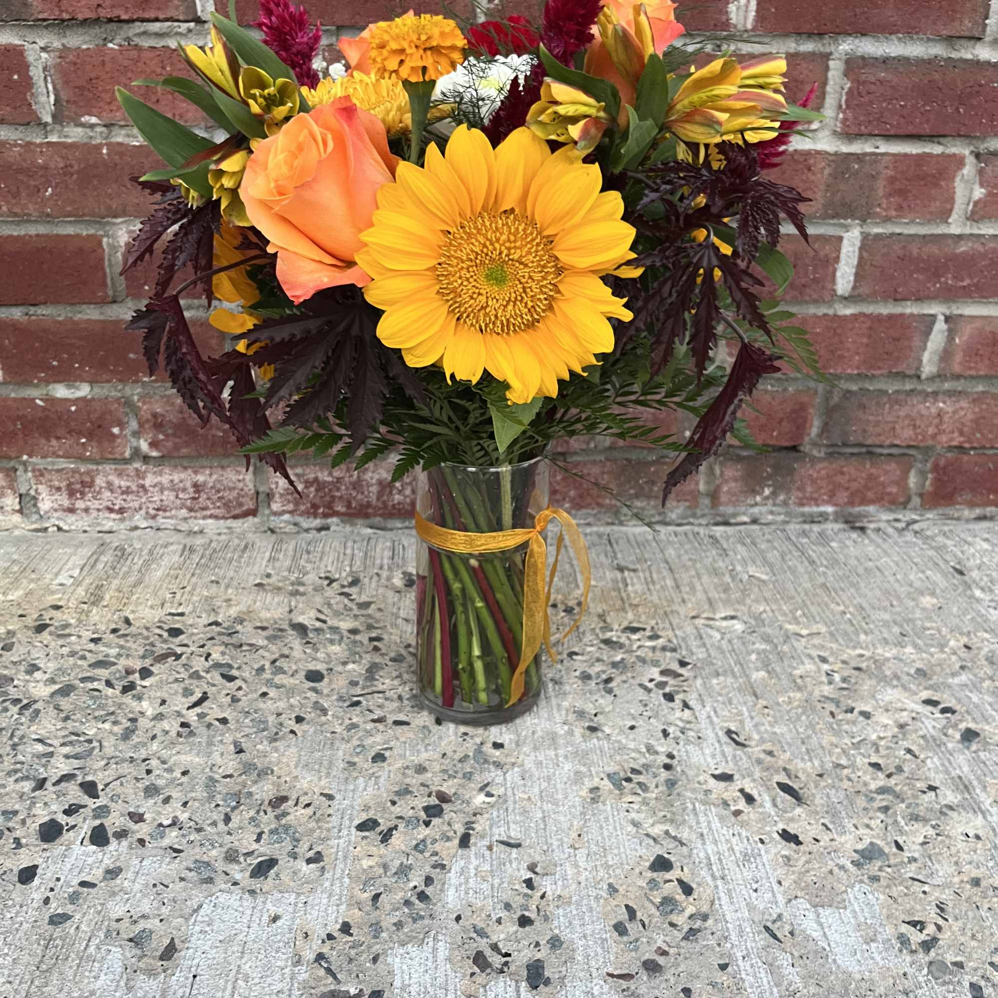 This arrangement is a wrapped bouquet with a mix of beautiful fall, photo 2 of 2