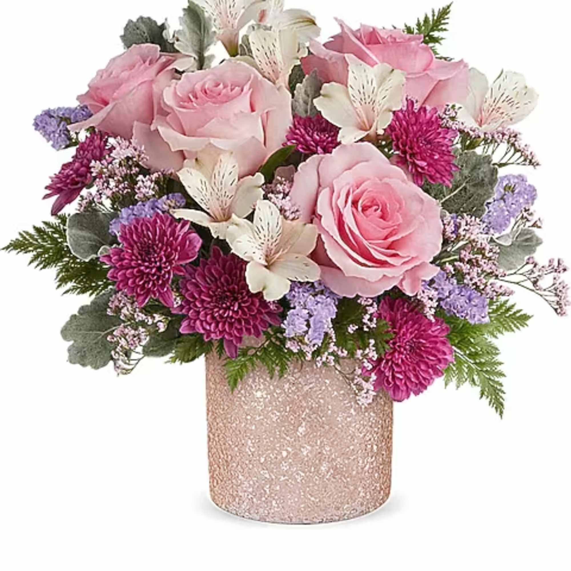 Pink roses and purple flowers arranged in a glittery vase