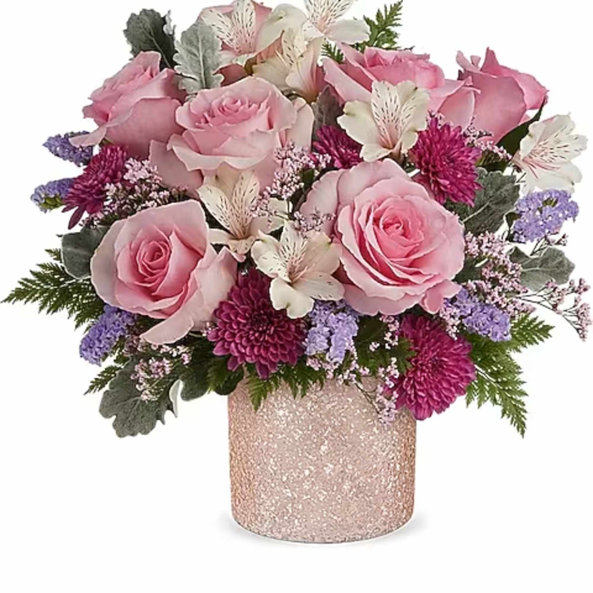 Pink roses and purple flowers arranged in a glittery vase