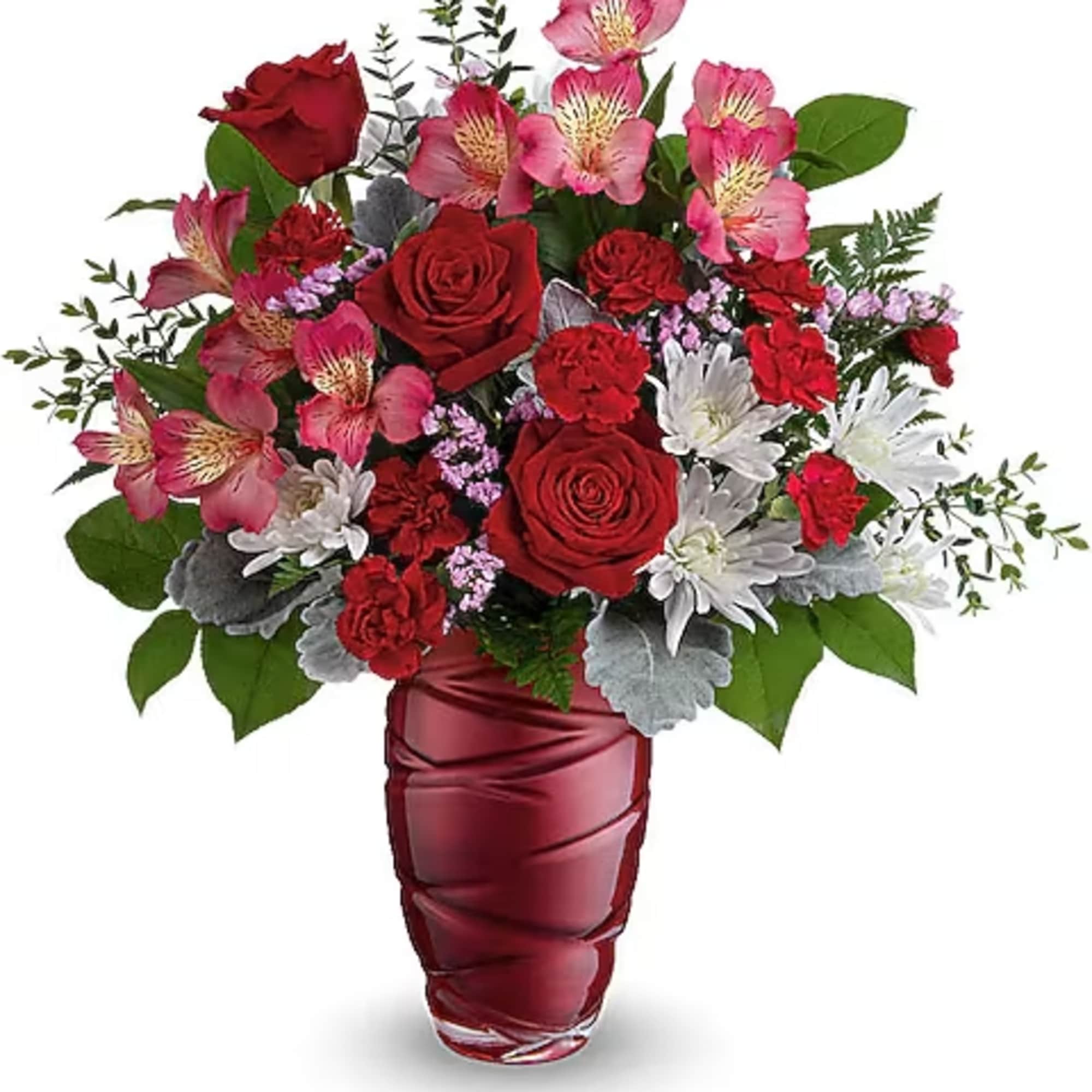 Red roses and pink alstroemeria in a red vase