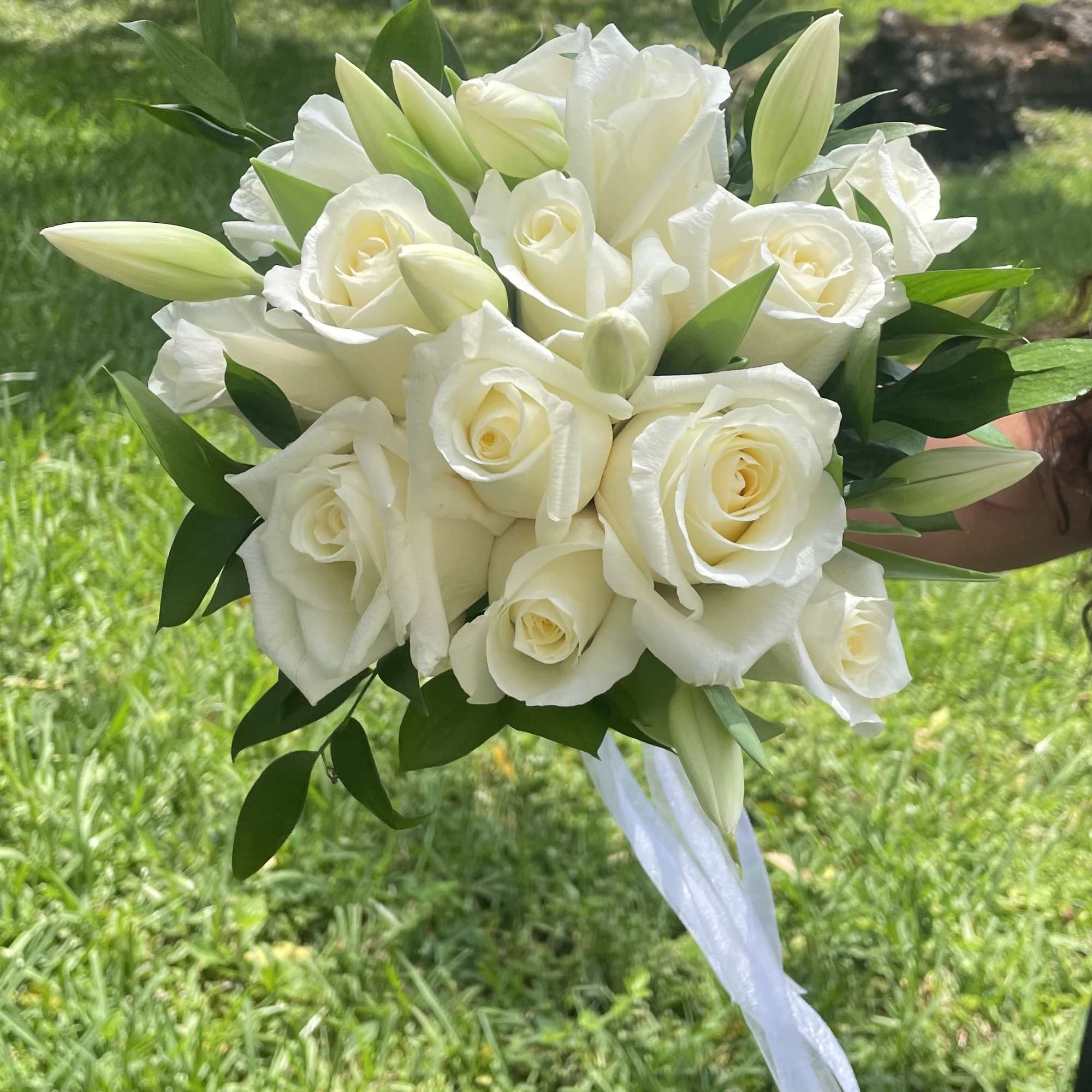 A classic white rose bouquet hand tied with ribbon. The perfect accessory, photo 3 of 3